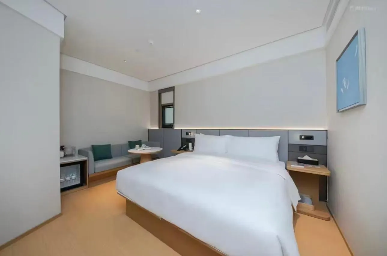 Bed in JI Hotel Beijing Yansha Sanyuan Bridge