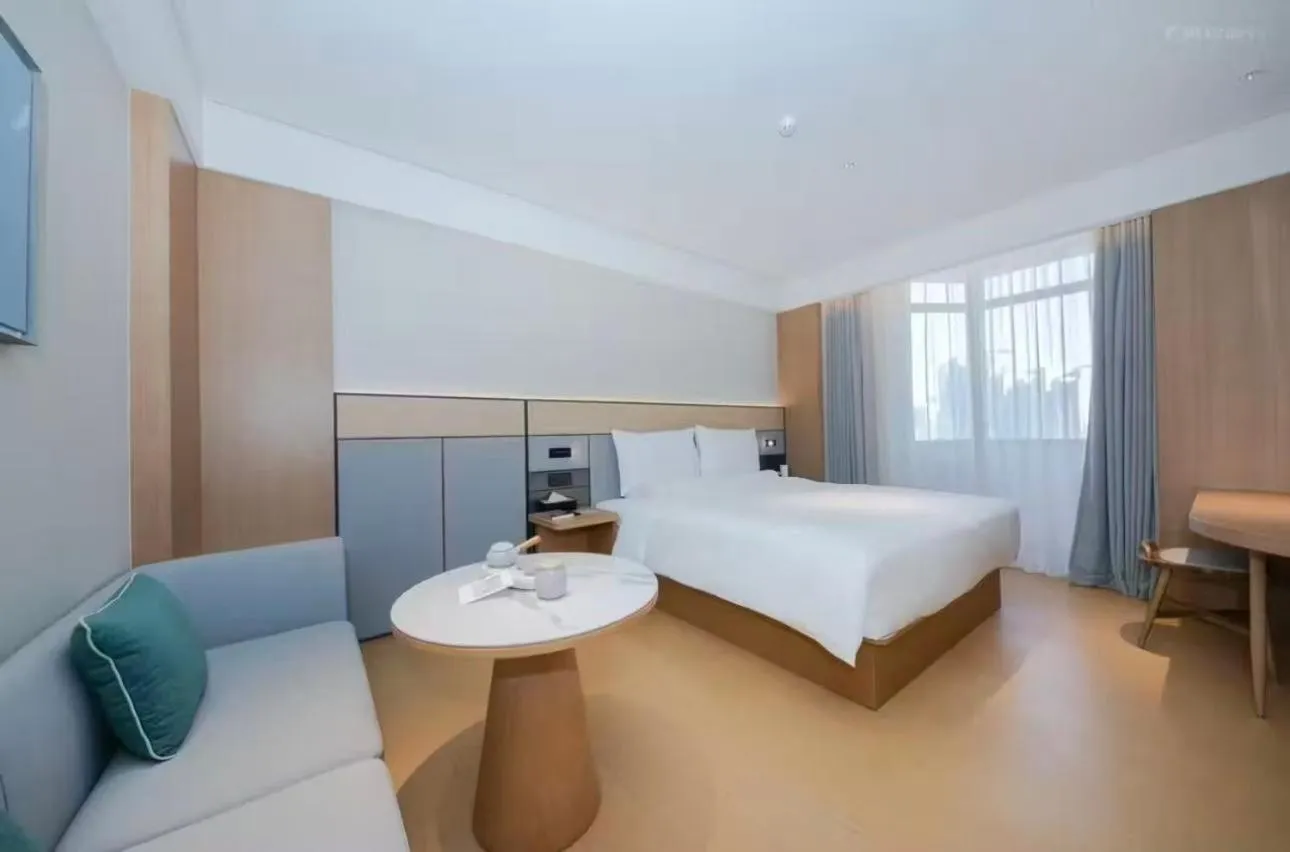 Bed in JI Hotel Beijing Yansha Sanyuan Bridge