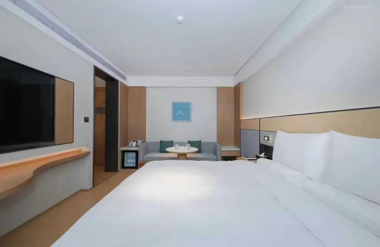 Bed in JI Hotel Beijing Yansha Sanyuan Bridge