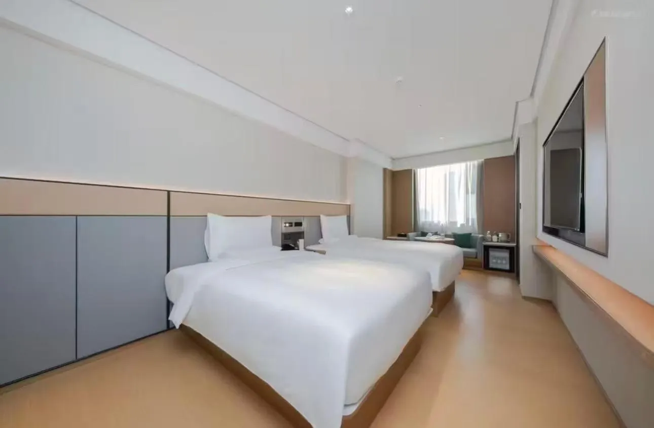 Bed in JI Hotel Beijing Yansha Sanyuan Bridge