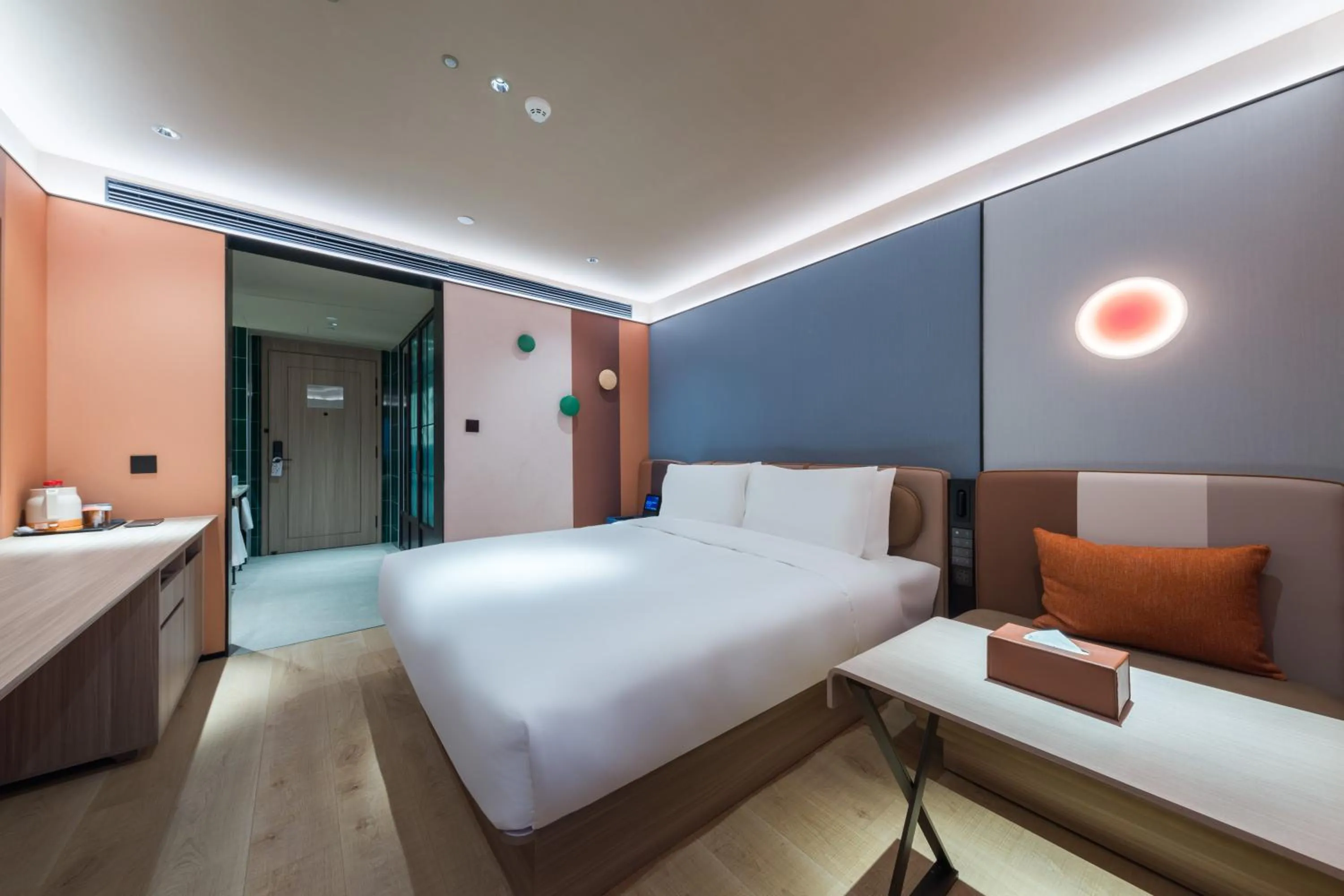 Bed in Orange Hotel Shanghai World Expo Center