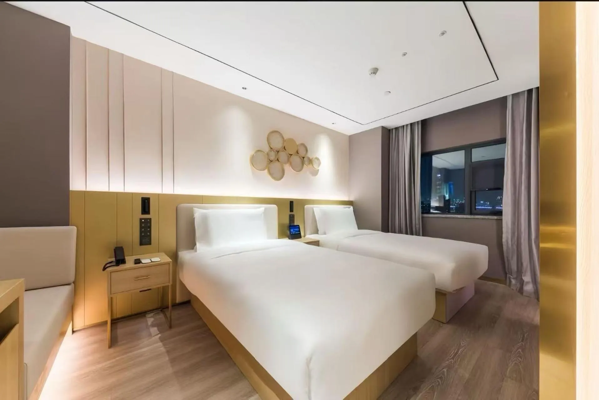 Bed in Orange Hotel Shanghai World Expo Center