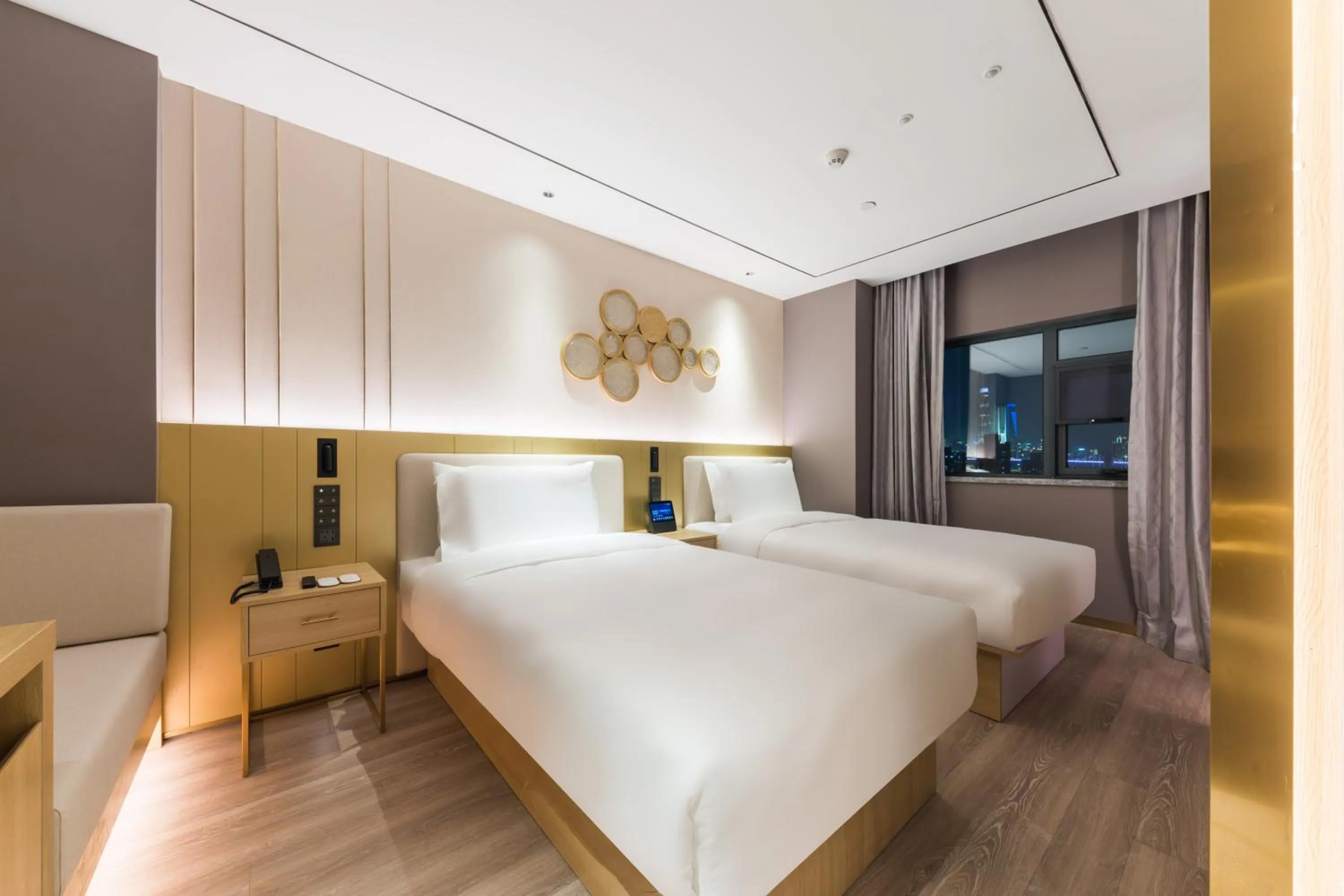 Bed in Orange Hotel Shanghai World Expo Center