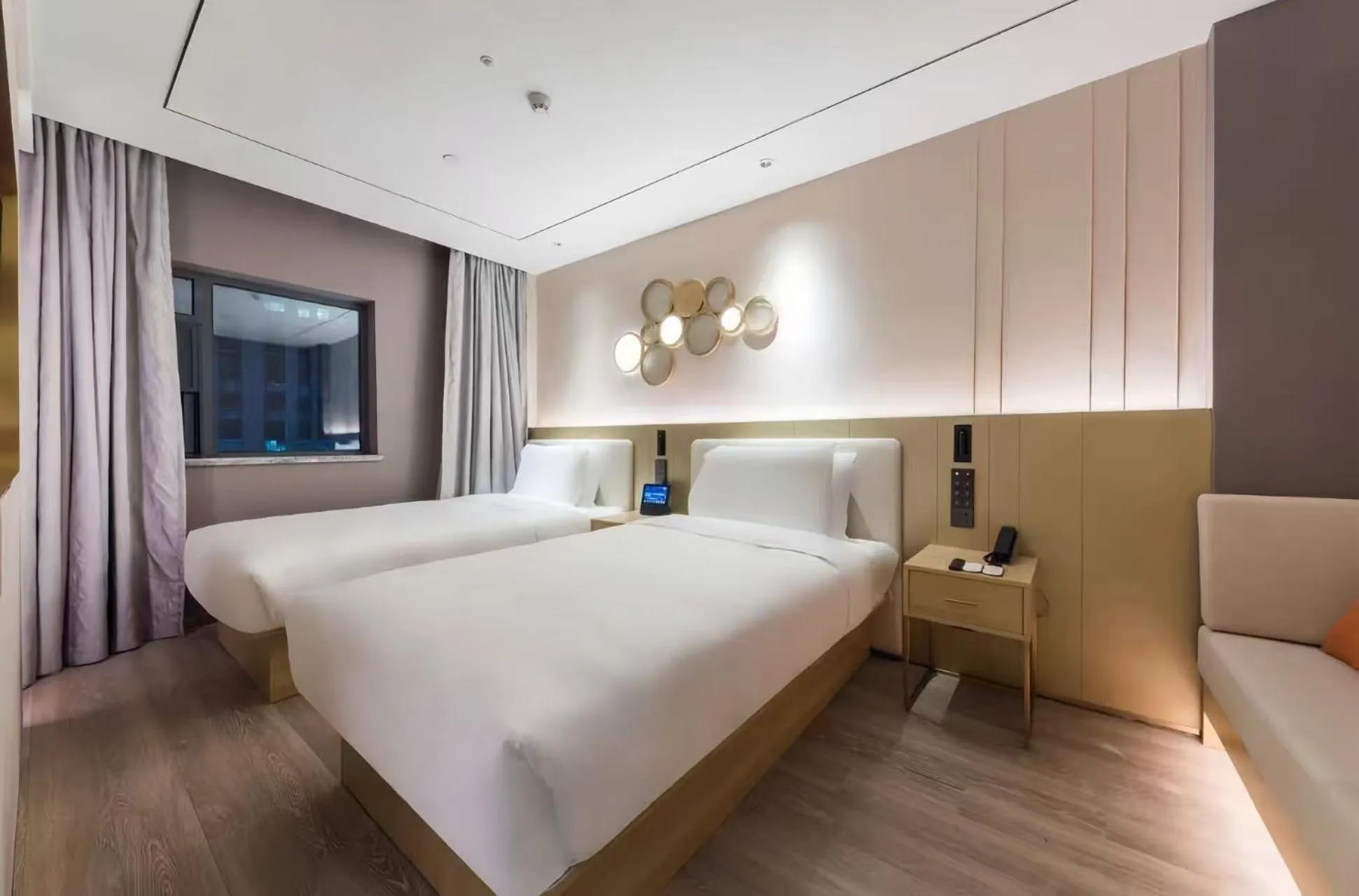 Bed in Orange Hotel Shanghai World Expo Center