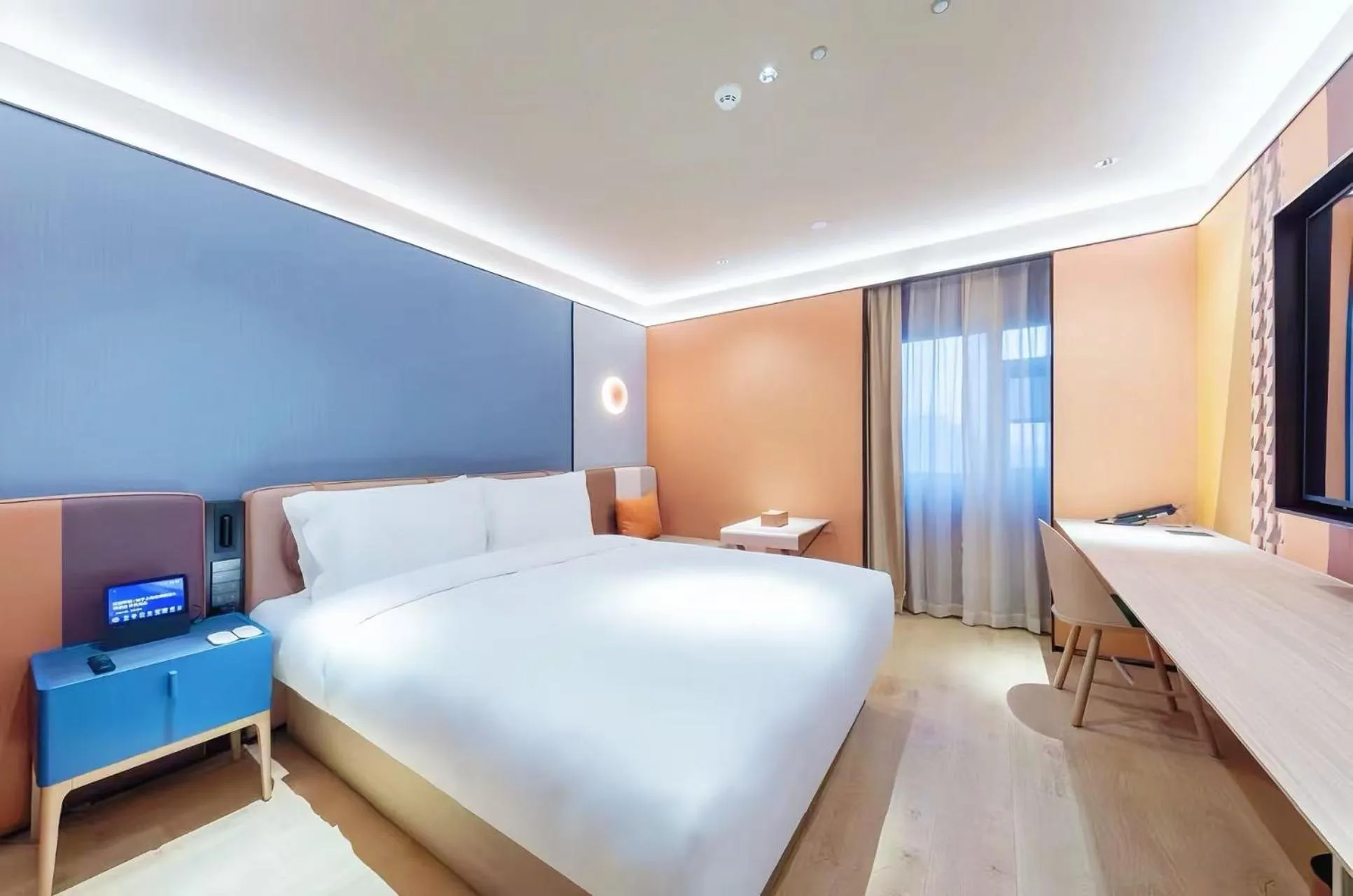 Bed in Orange Hotel Shanghai World Expo Center