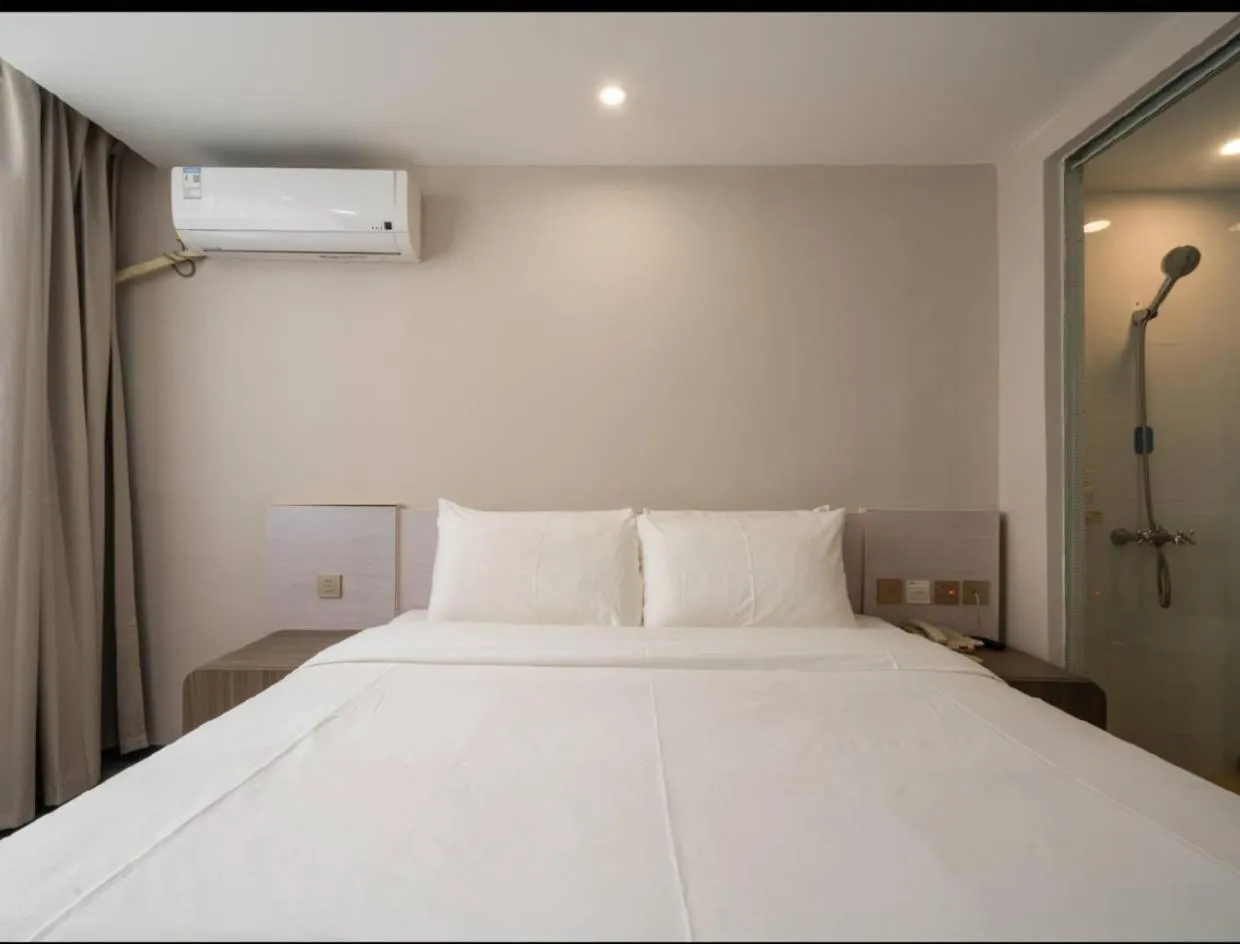 Bed in Hanting Hotel Shenzhen Taian Subway Station