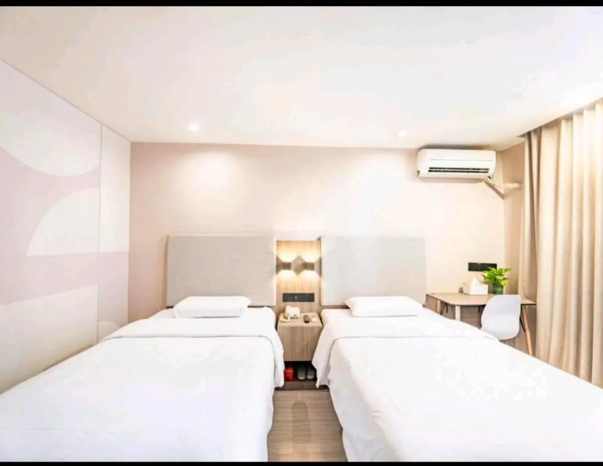 Bed in Hanting Hotel Shenzhen Taian Subway Station