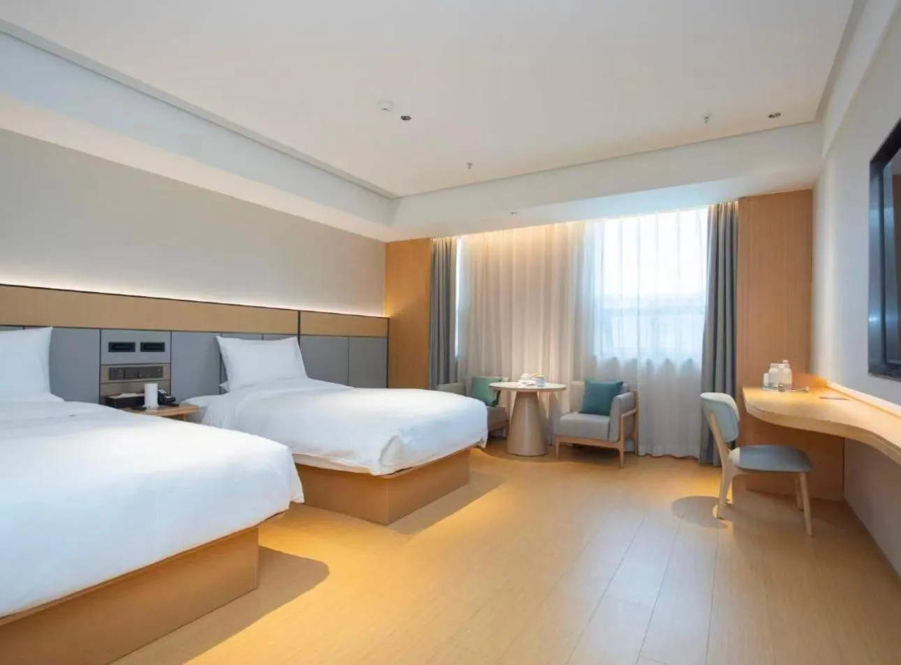Photo of the whole room, Bed in JI Hotel Shanghai Dianshanhu Avenue Metro Station