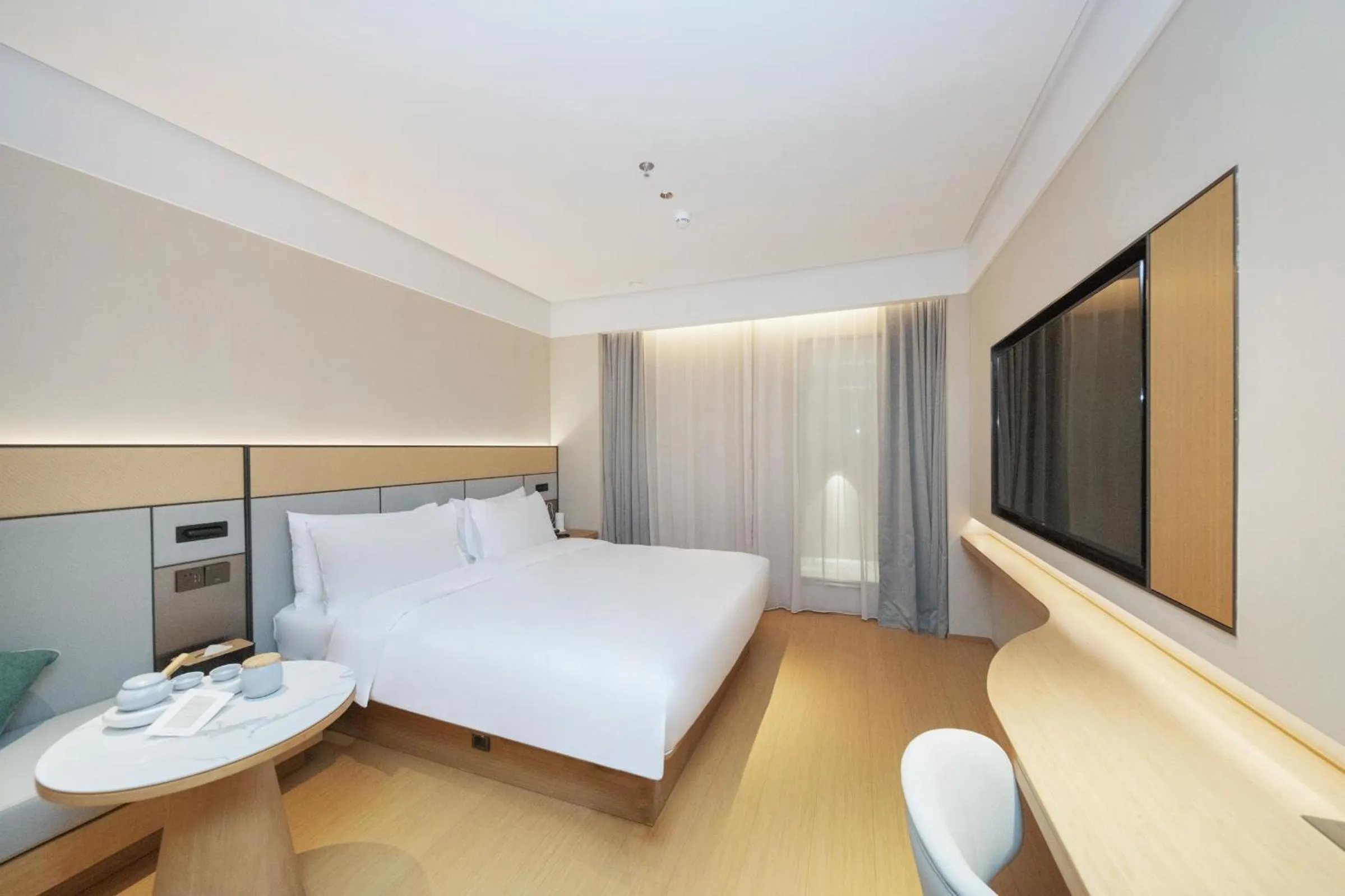 Bed in JI Hotel Shenzhen Convention & Exhibition Center Gangxia Subway Station