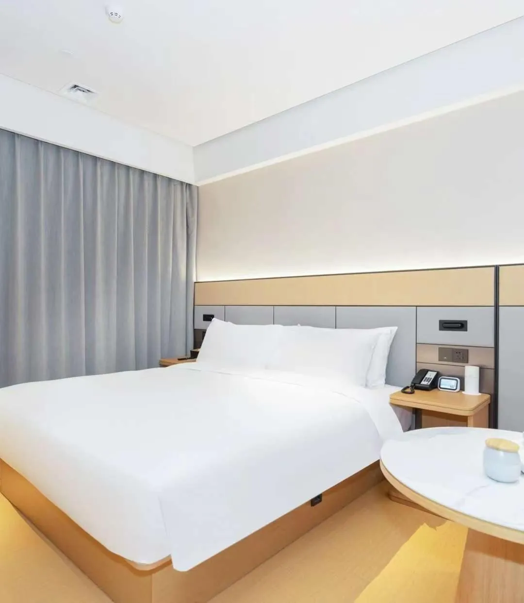 Bed in JI Hotel Guangzhou Fangcun Huadiwan