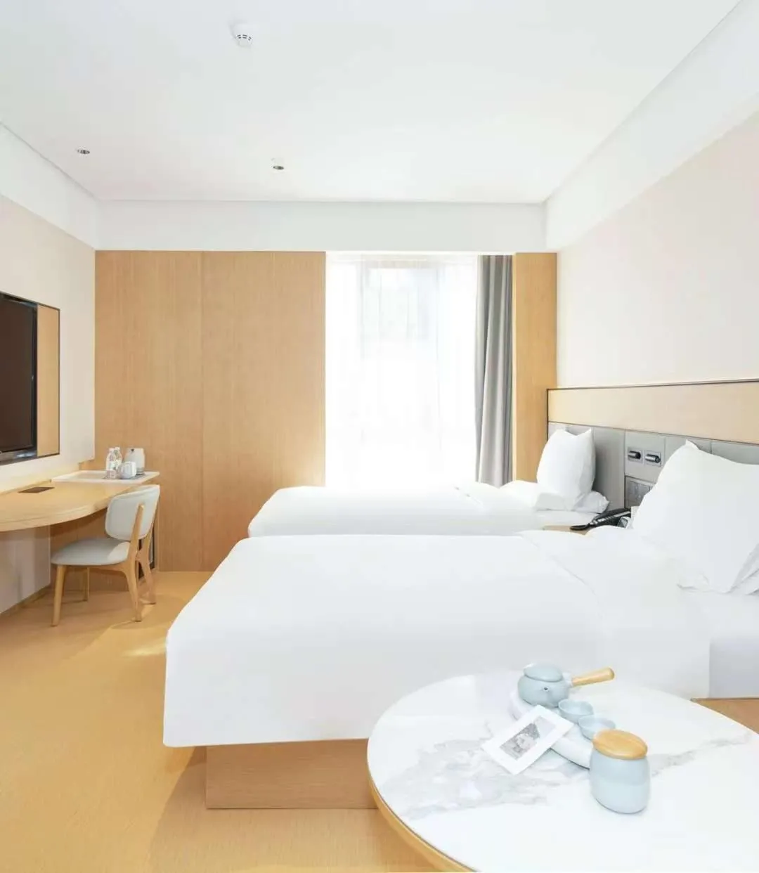 Bed in JI Hotel Guangzhou Fangcun Huadiwan