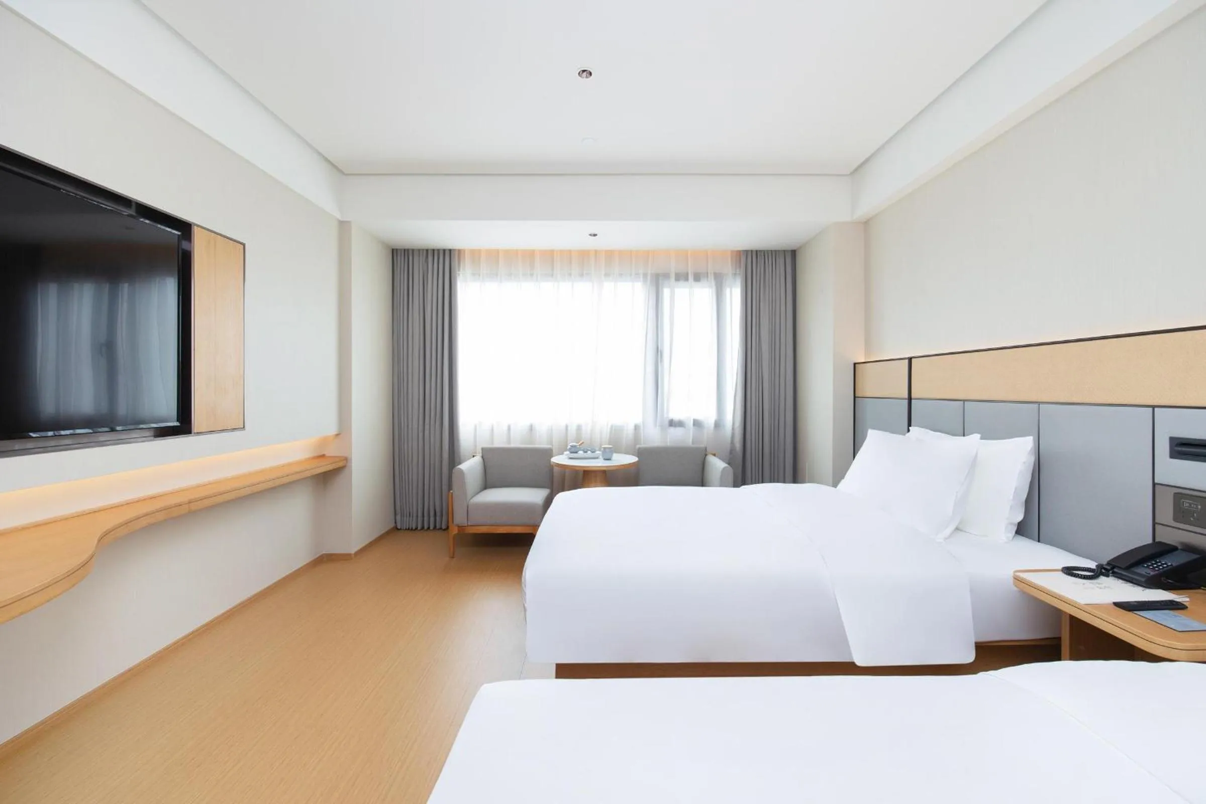 Bed in JI Hotel Shenzhen Huaqiang North Huaqiang Road Subway Station