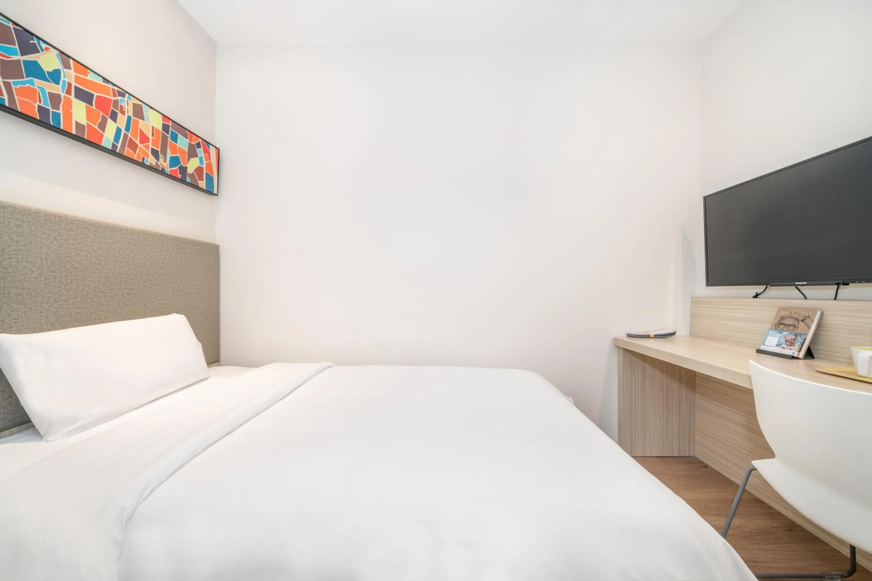 Bed in Hanting Hotel Beijing Exhibition Center Fuwai Hospital