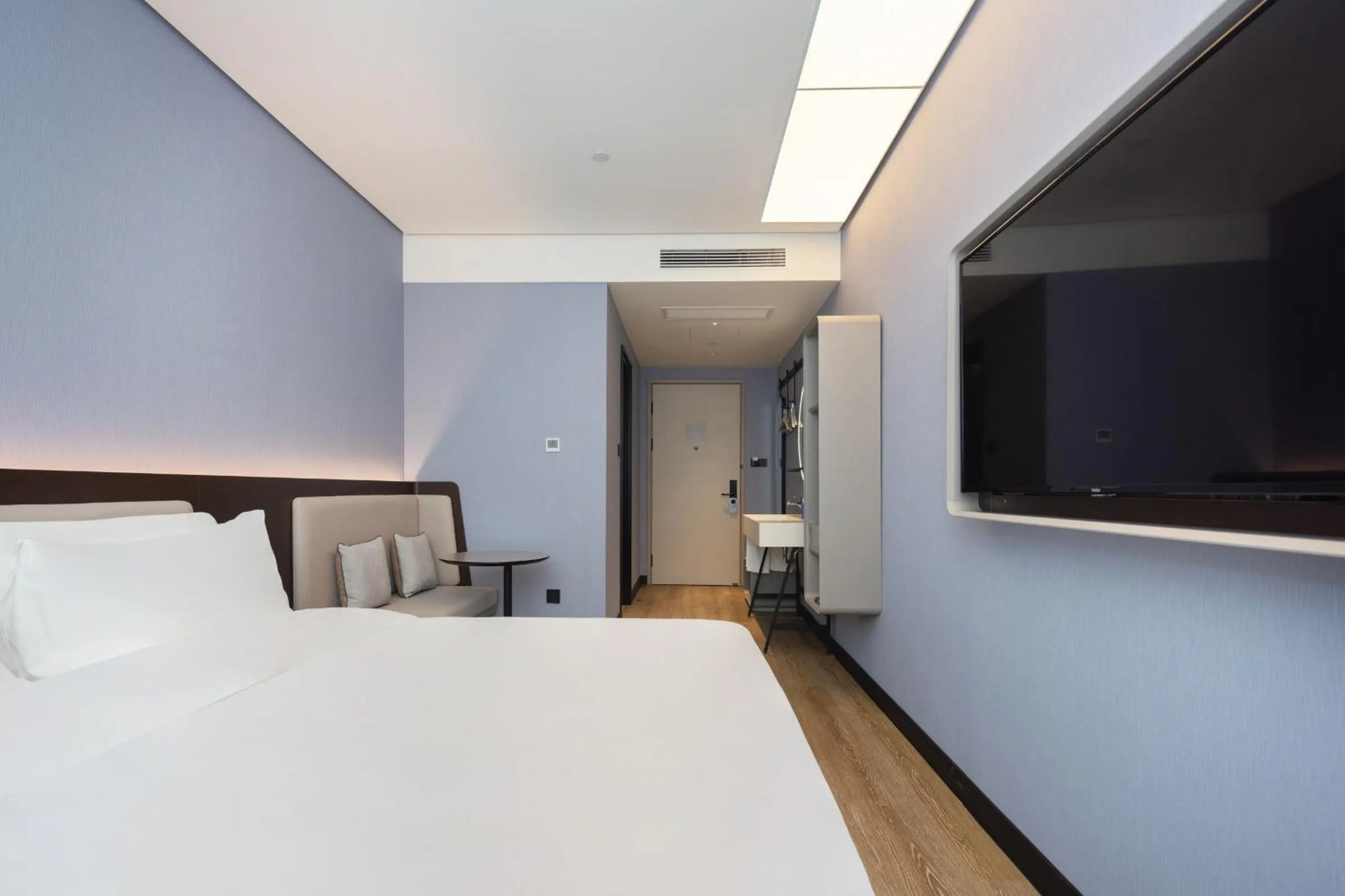 Bed in Hanting Hotel Shanghai Yishan Road Center