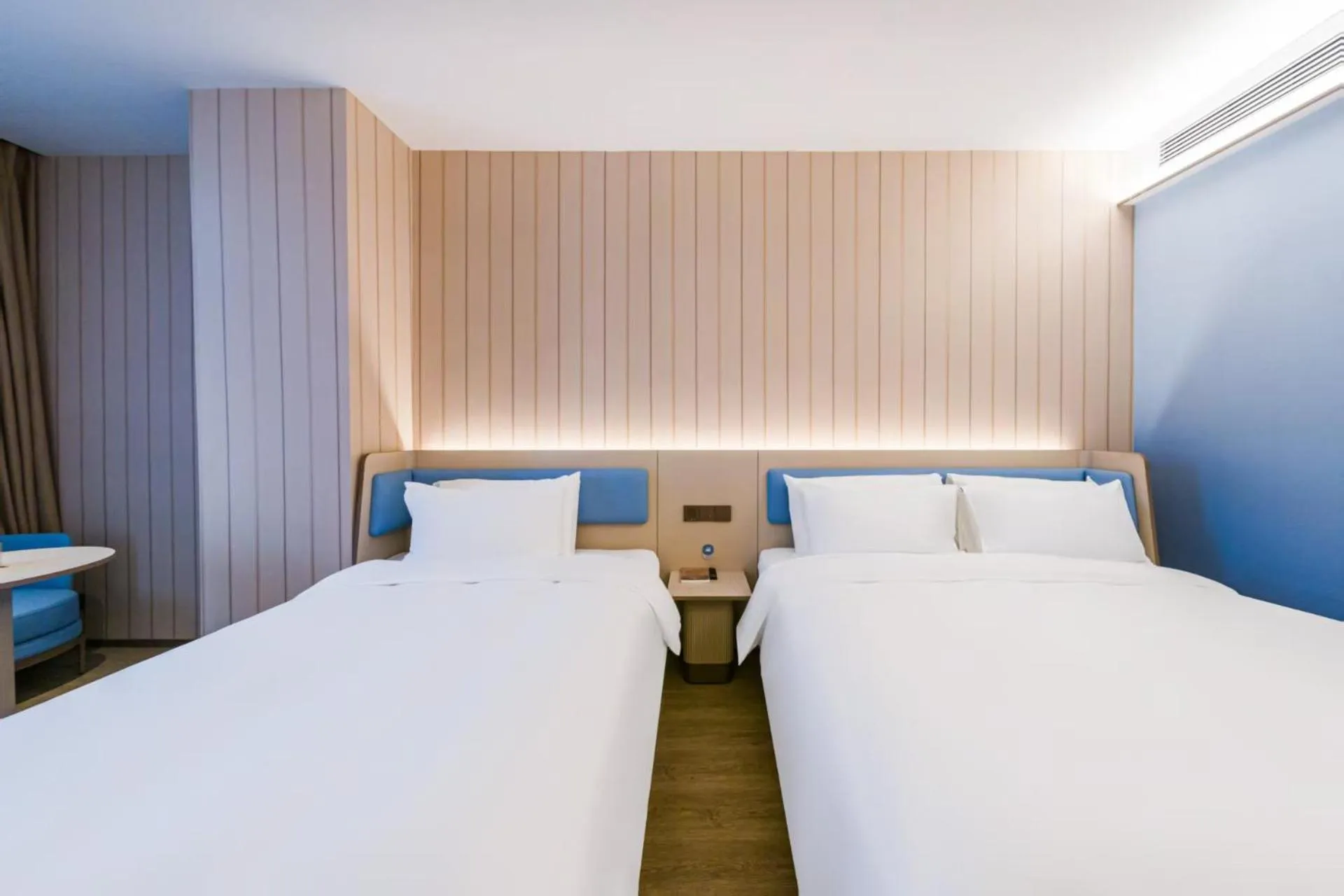 Bed in Hanting Hotel Shanghai Pudong Airport Shixin Road