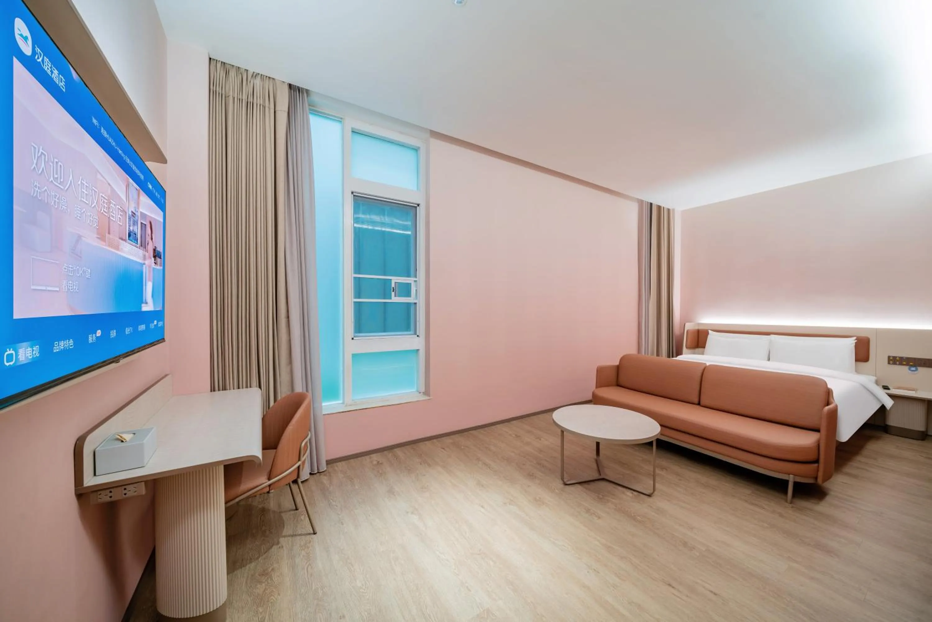 Seating area, Bed in Hanting Hotel Guangzhou Nangang Subway Station