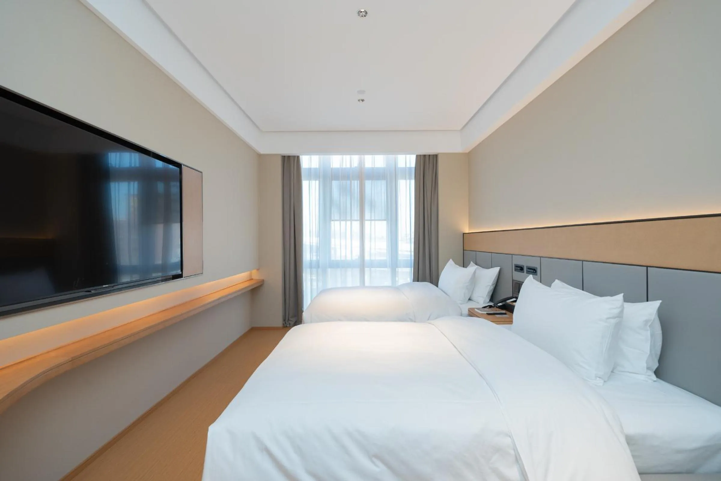 Bed in JI Hotel Guangzhou Panyu Chimelong Wanbo Center