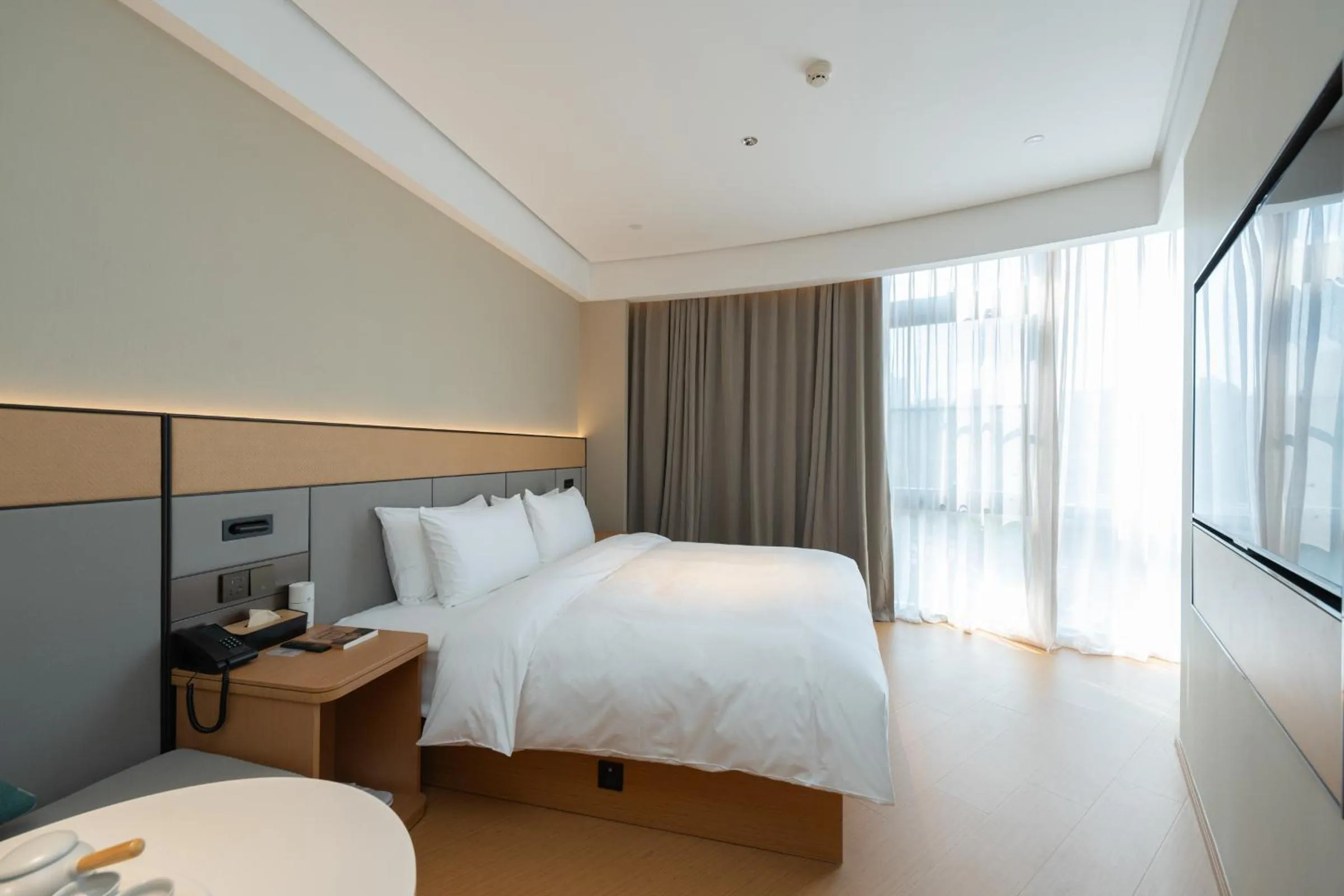 Bed in JI Hotel Guangzhou Panyu Chimelong Wanbo Center