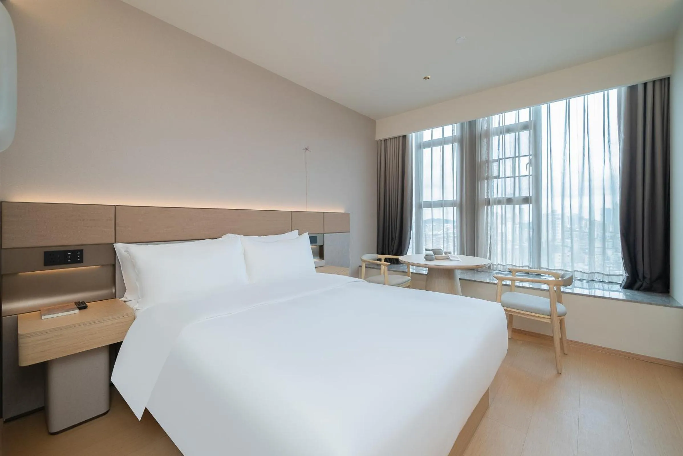 Bed in JI Hotel Guangzhou Huangpu Dasha East Subway Station