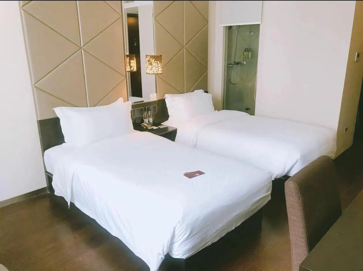 Bed in Orange Hotel Shanghai Xujiahui Damuqiao Road