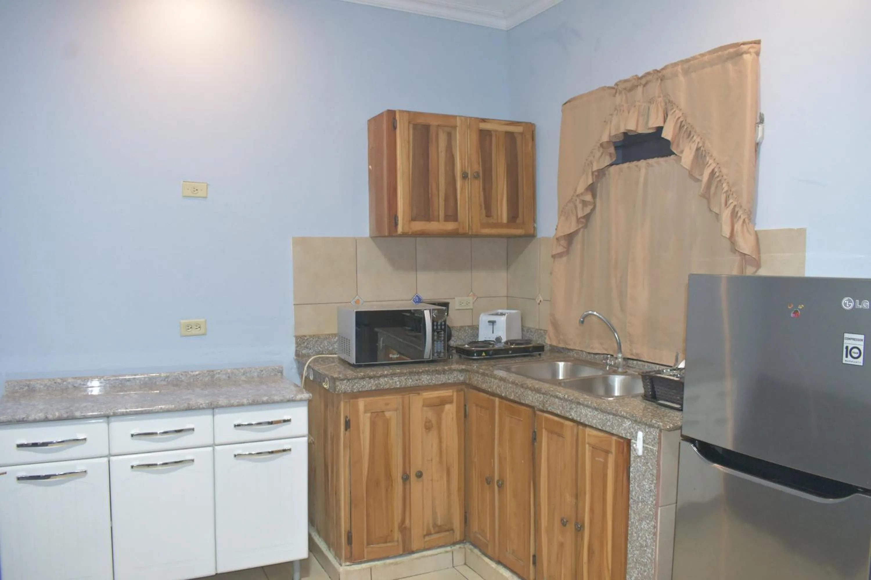 Kitchen or kitchenette in Apartamentos Alta Vista David