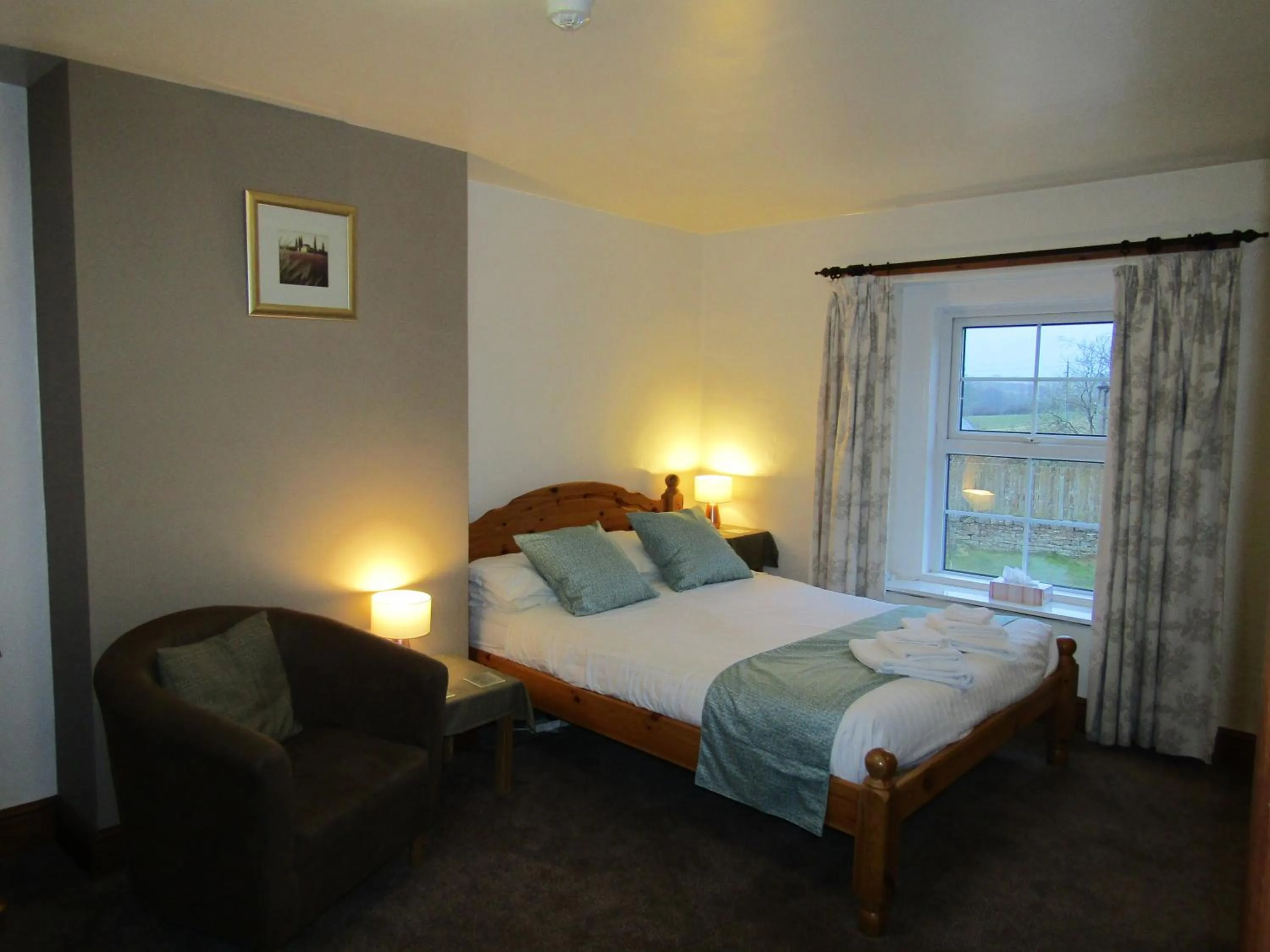 Bed in The Belted Will Inn