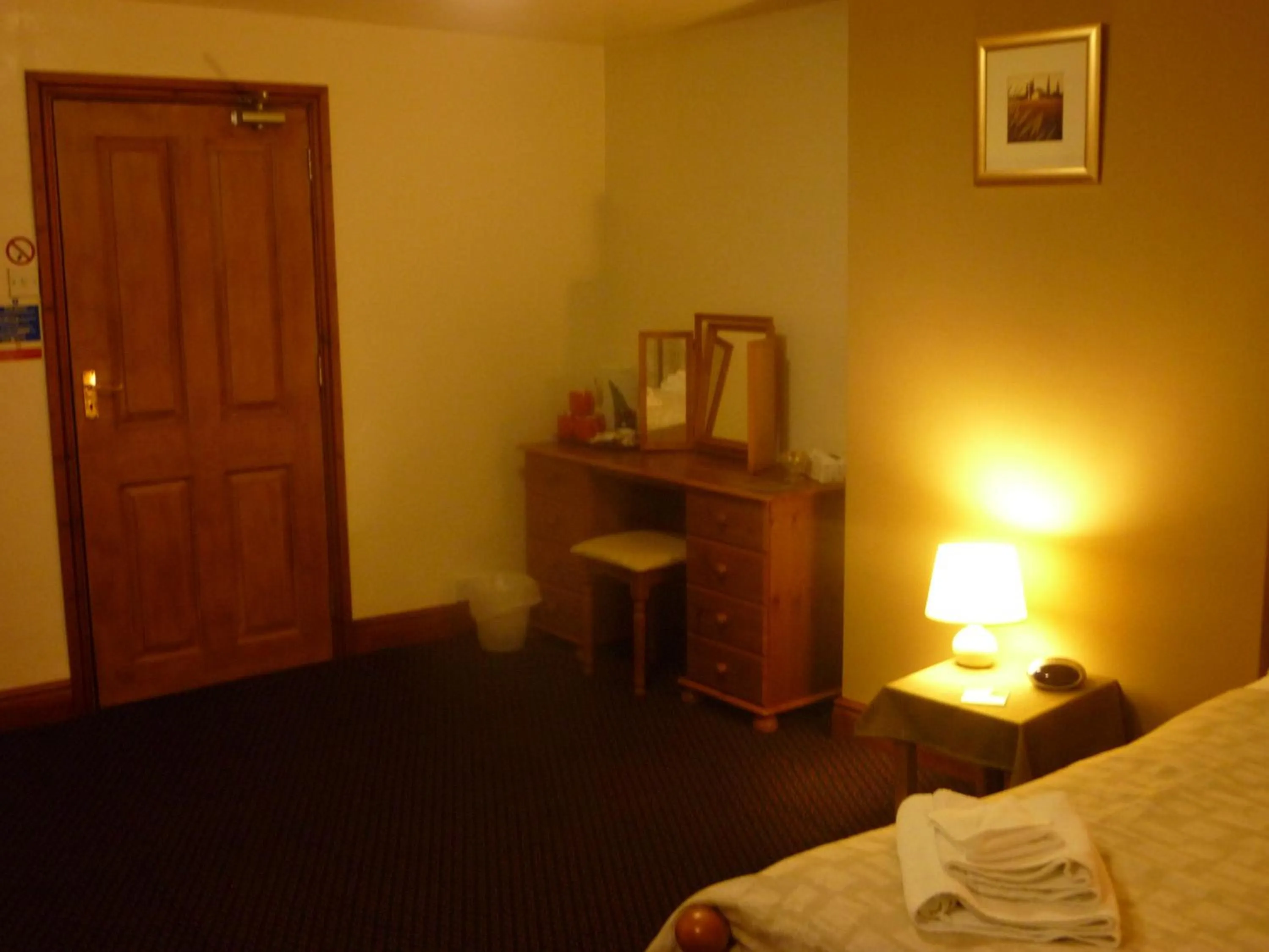 Decorative detail, Bed in The Belted Will Inn