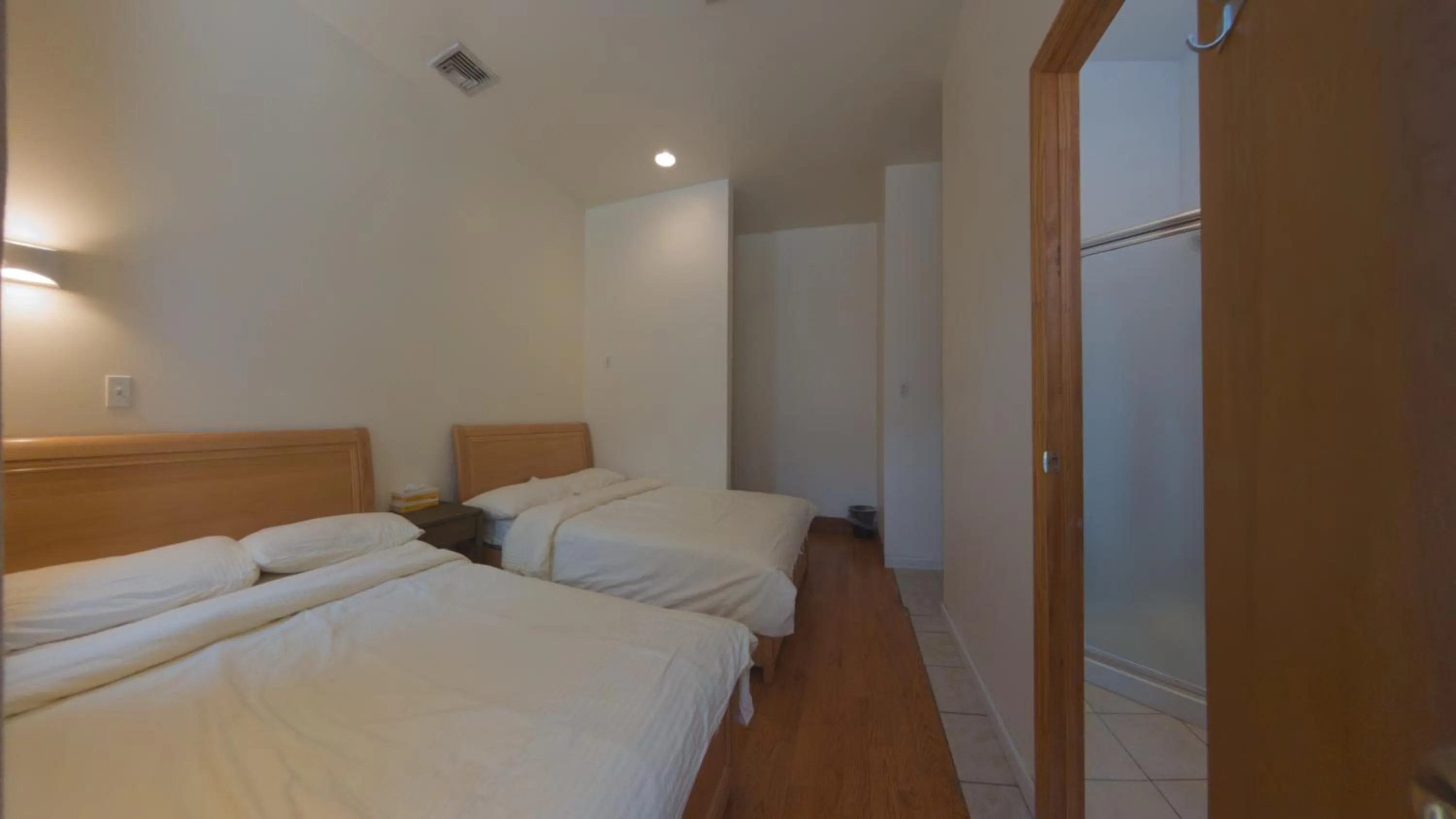 Bed in U.S. Pacific Hotel