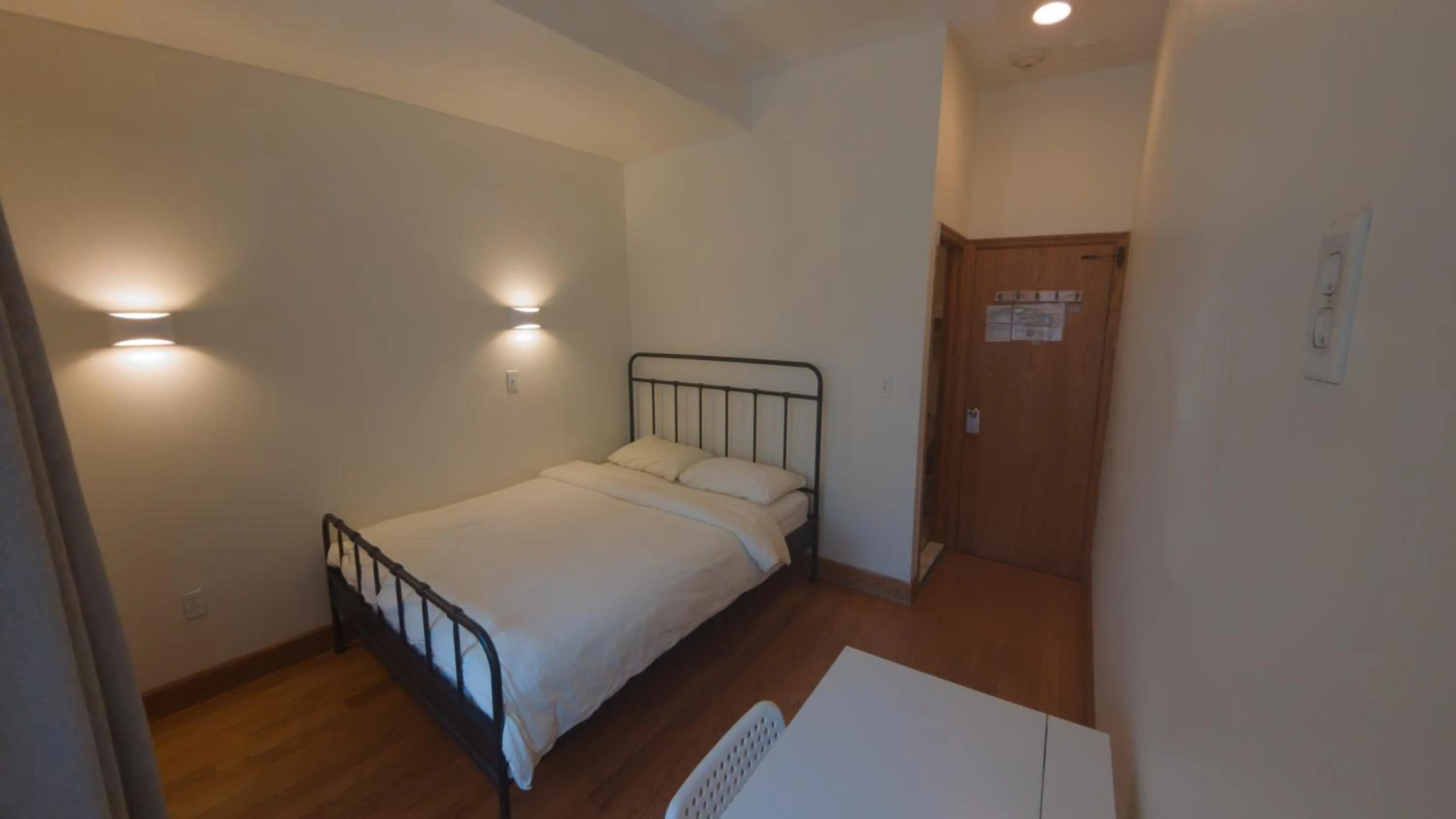 Bed in U.S. Pacific Hotel