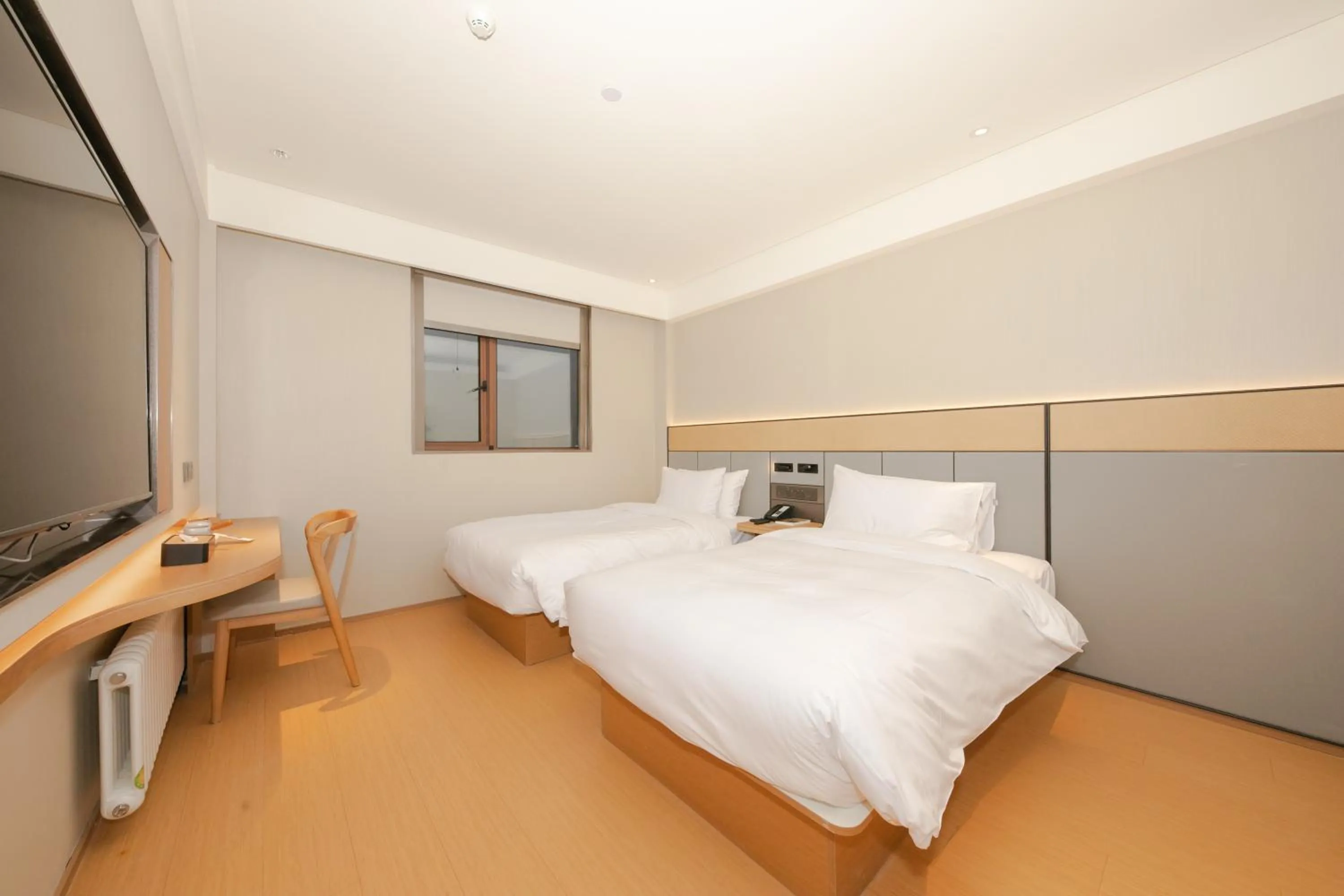 Bed in JI Hotel Beijing Capital Normal University