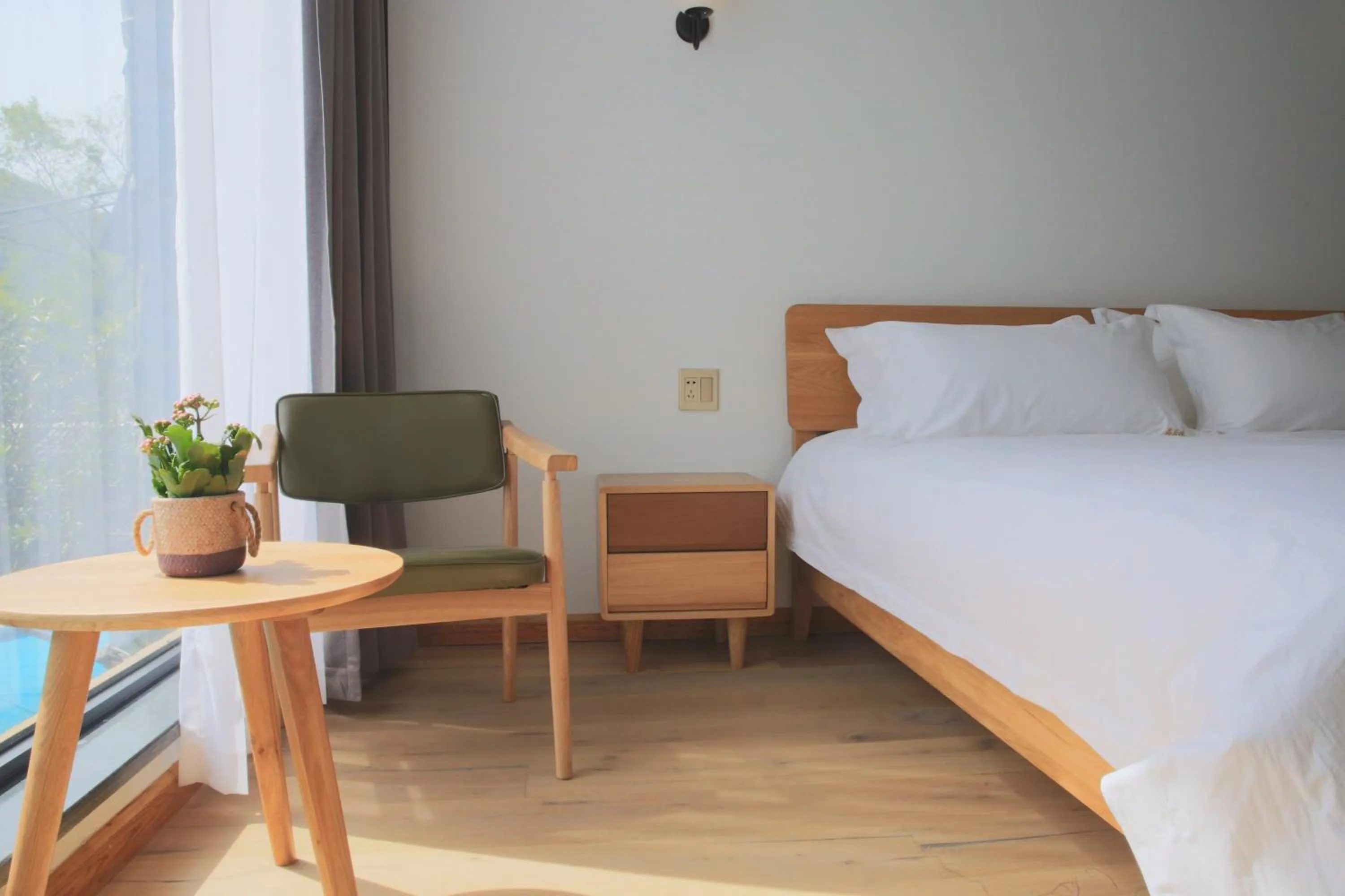 Decorative detail, Bed in Moganshan Pinhouwu Hotel