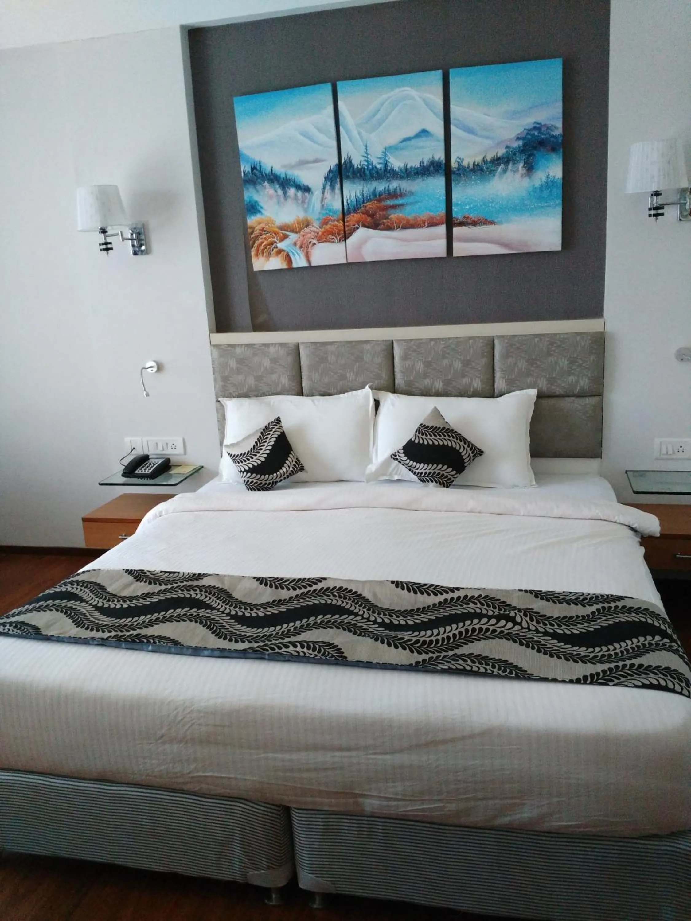 Photo of the whole room, Bed in Maha Bodhi Hotel.Resort.Convention Centre