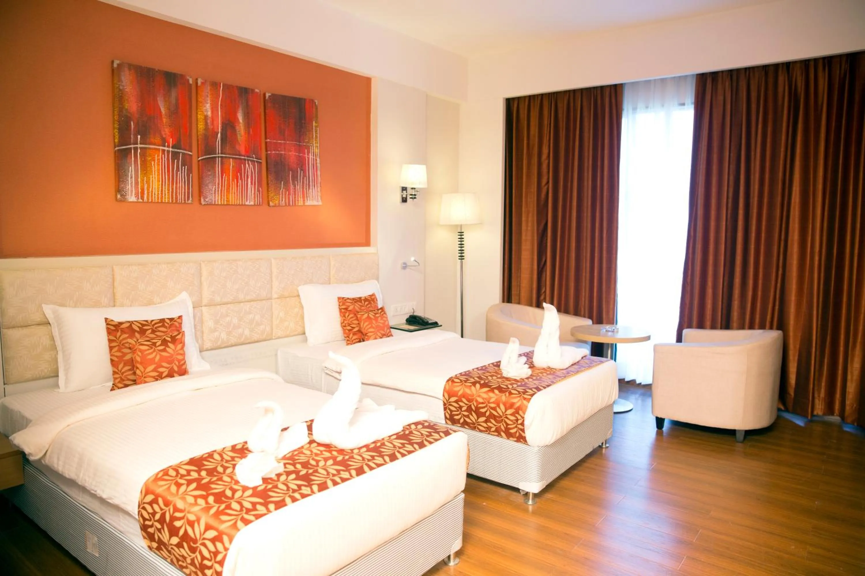 Photo of the whole room, Bed in Maha Bodhi Hotel.Resort.Convention Centre