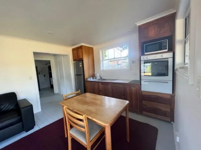 Kitchen or kitchenette in Glenaire Apartments at Frazer St