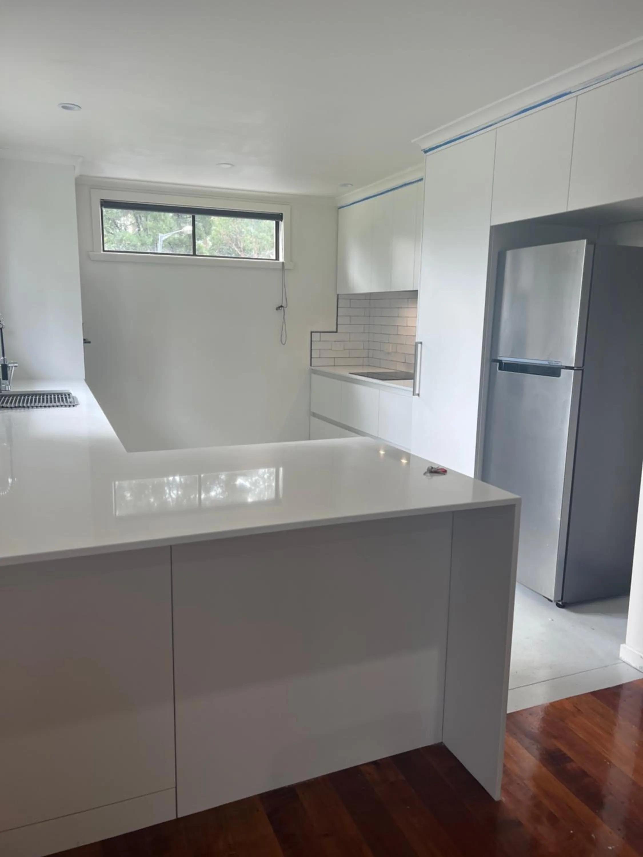 Kitchen or kitchenette in Glenaire Apartments at Frazer St