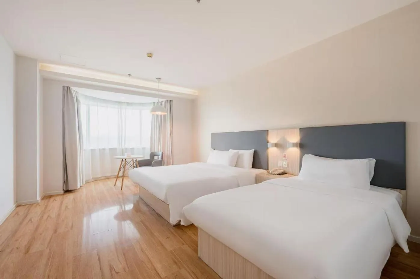 Bed in Hanting Hotel Beijing Railway Station Subway Station