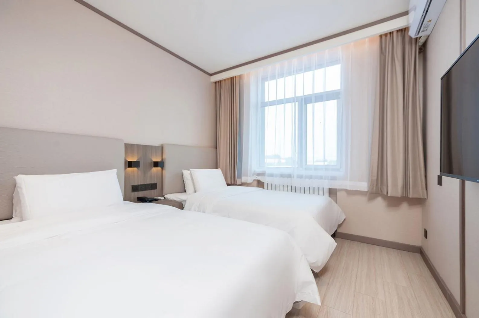 Bed in Hanting Hotel Beijing Changping Shahe Gonghuacheng