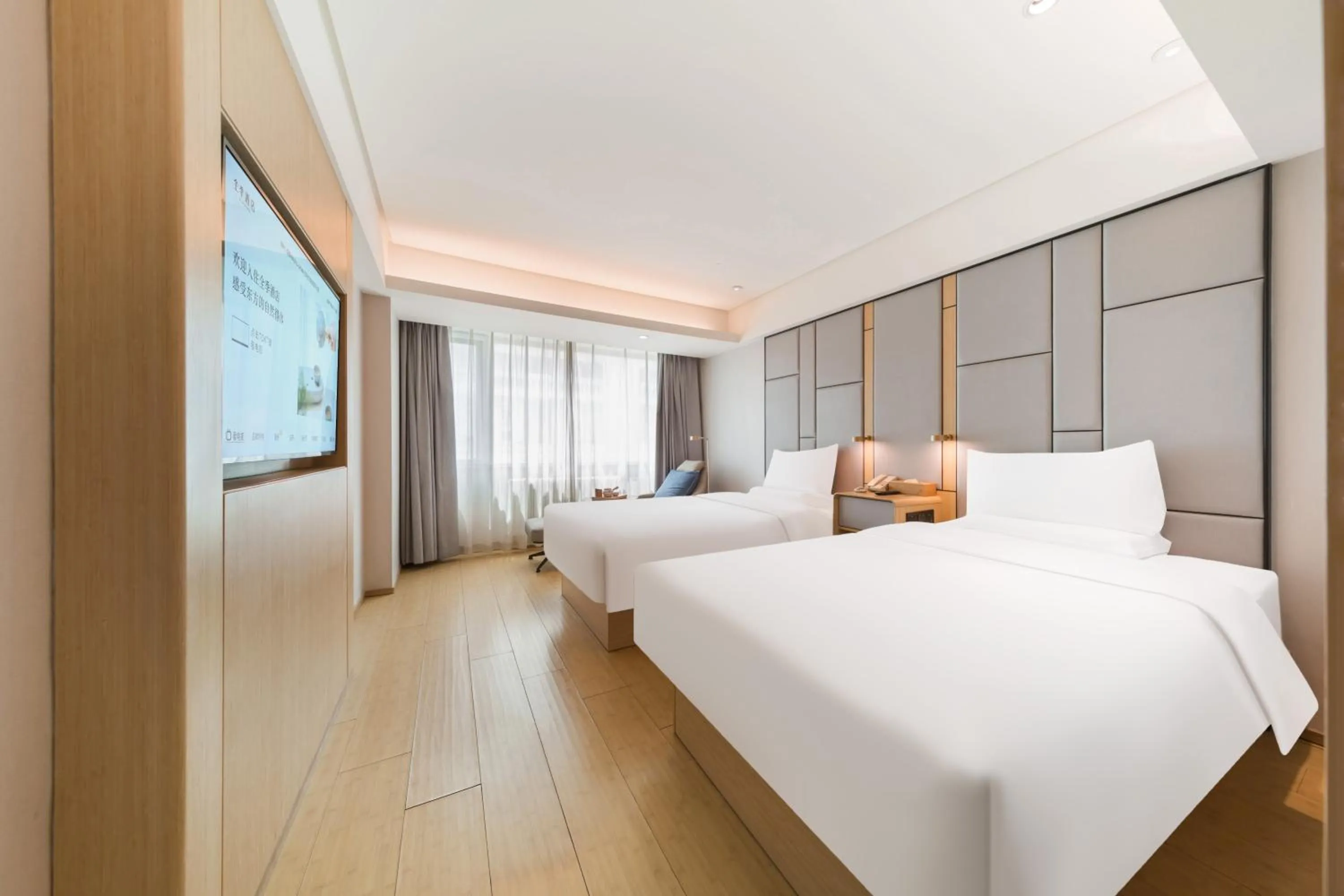 Bed in JI Hotel Beijing Nanluoguxiang Andingmen Subway Station