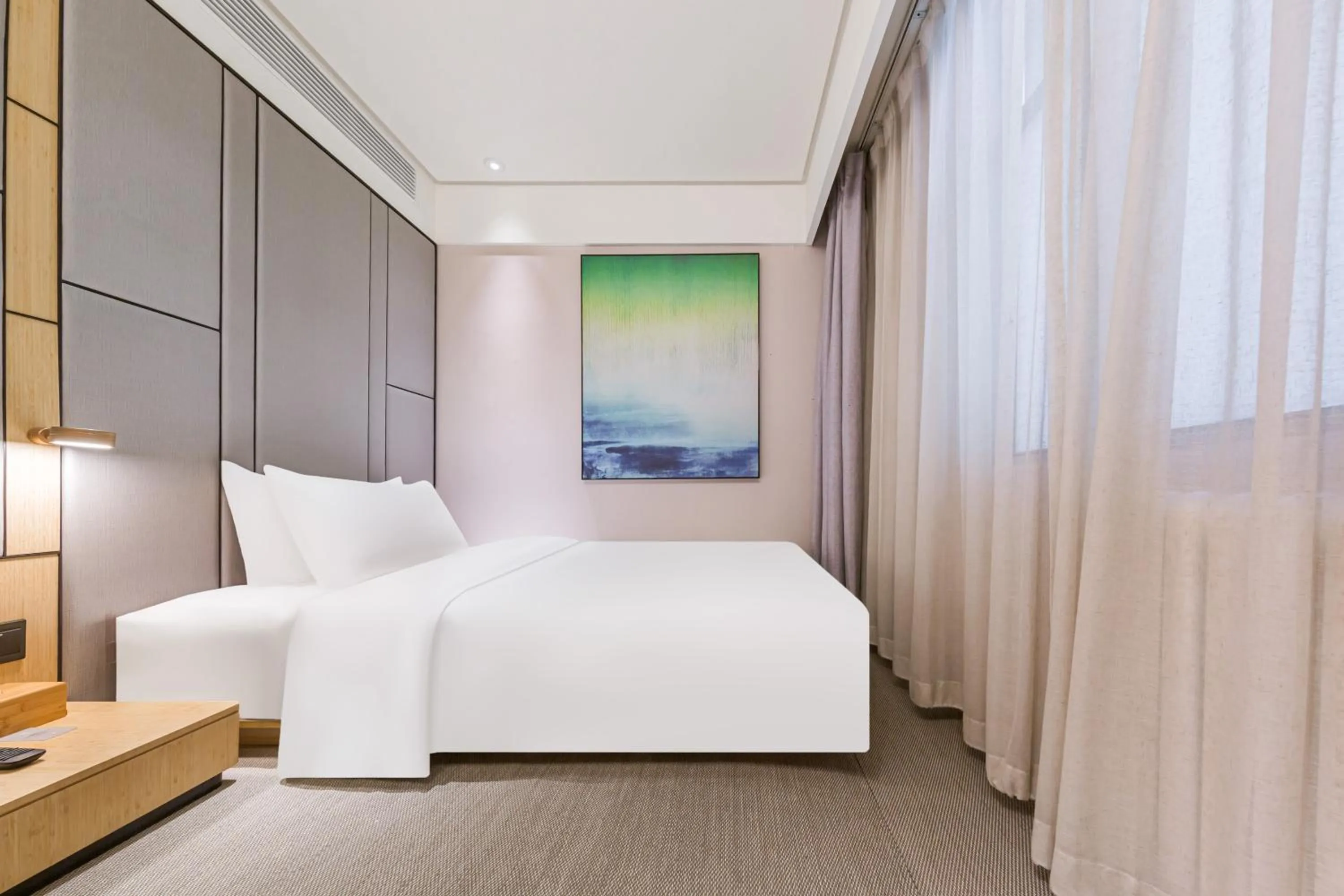 Bed in JI Hotel Beijing Nanluoguxiang Andingmen Subway Station