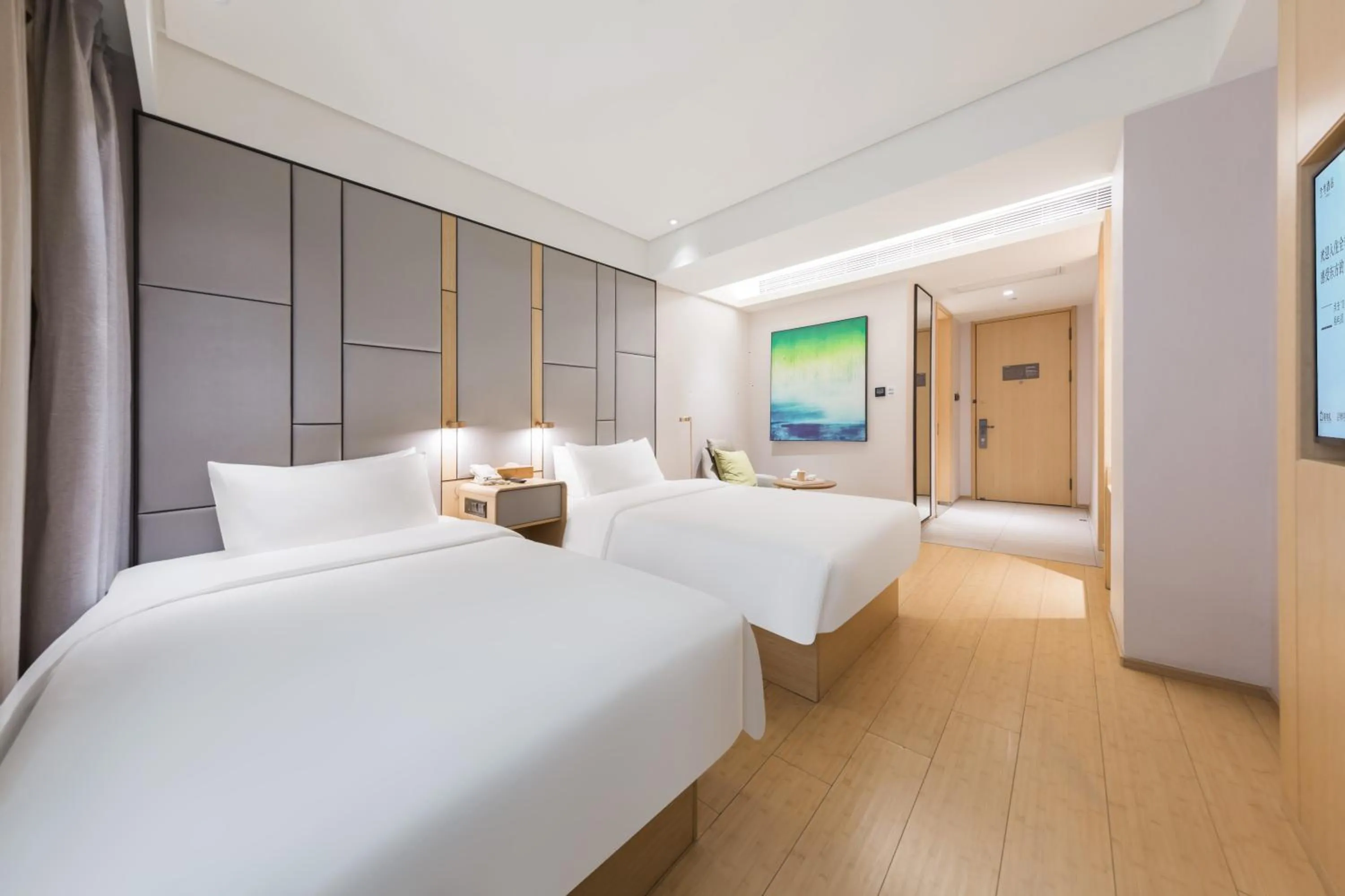 Bed in JI Hotel Beijing Nanluoguxiang Andingmen Subway Station