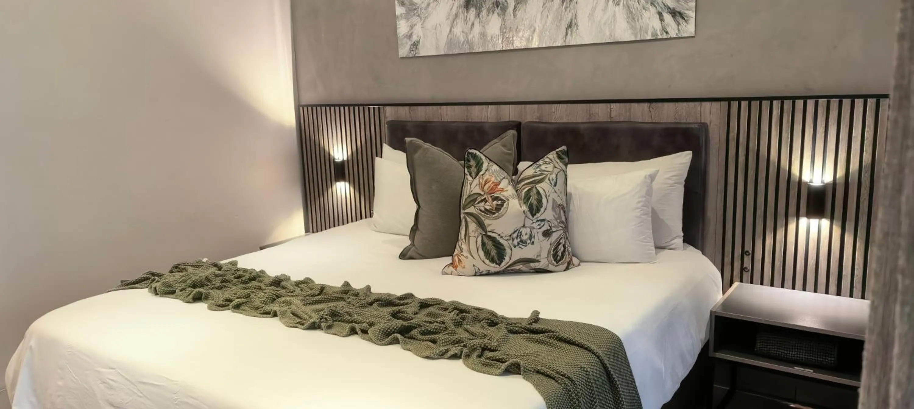 Bed in The Cycad Lodge & Chalets