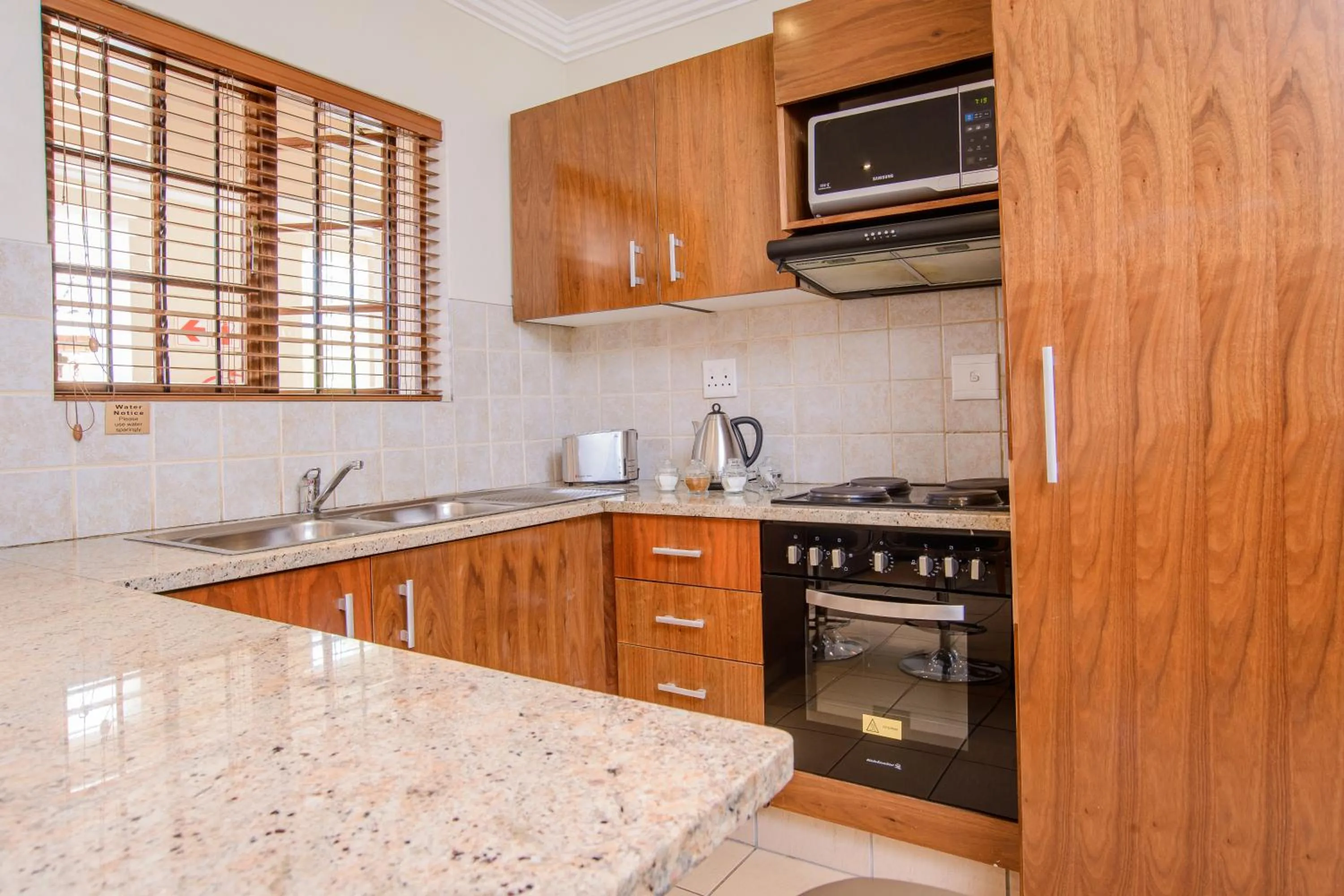 Kitchen or kitchenette in The Cycad Lodge & Chalets
