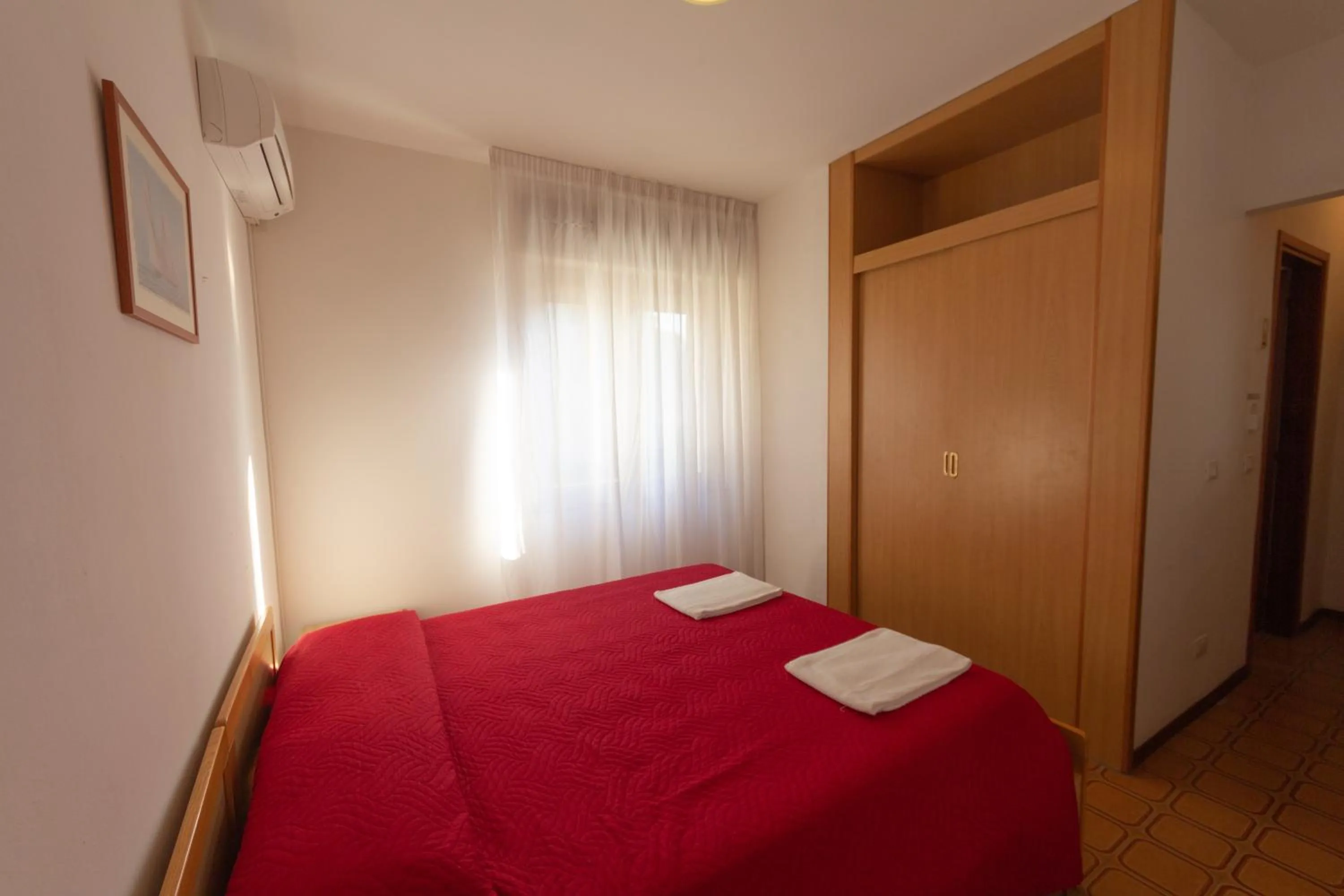 Bed in Hotel Calipso