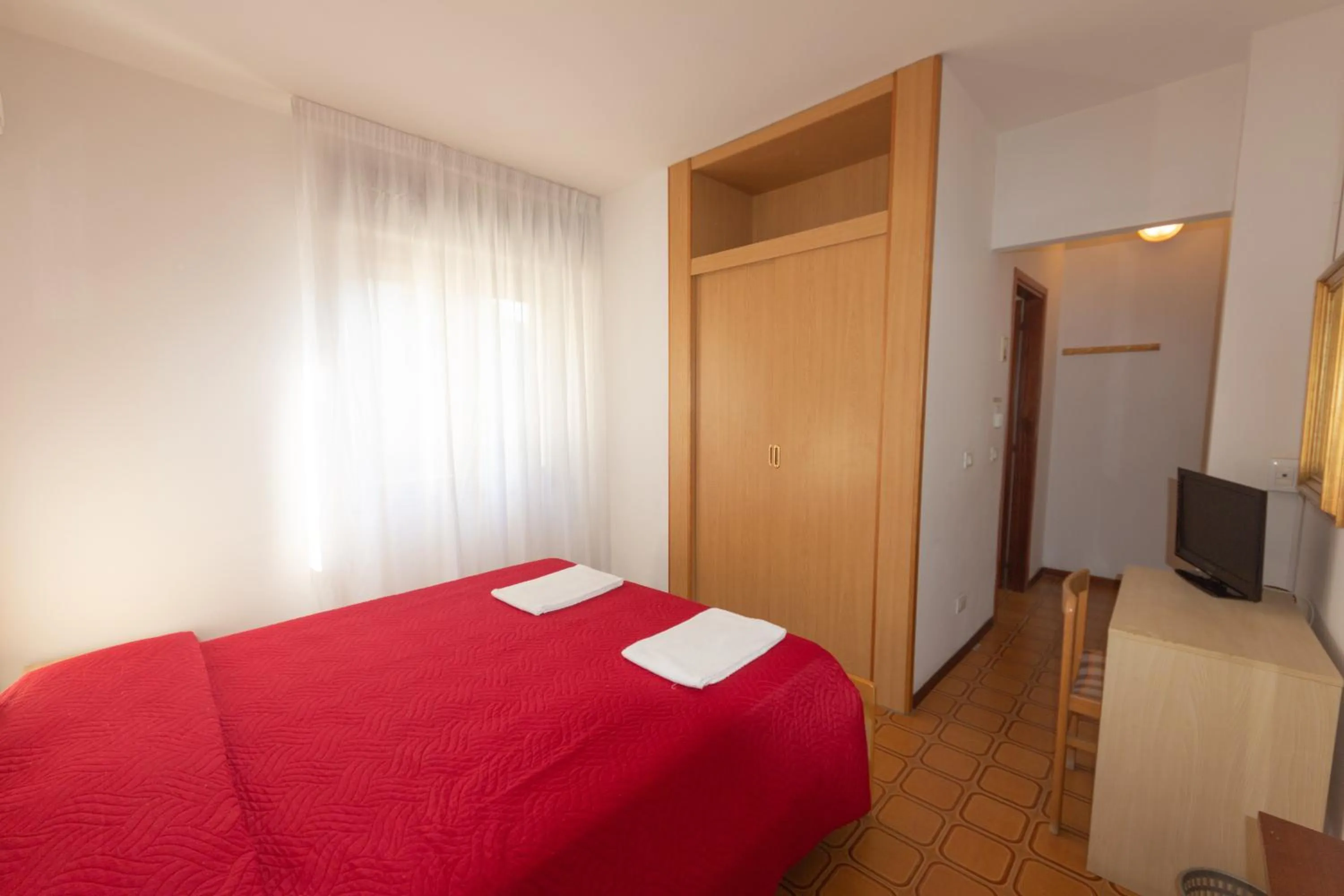 Bed in Hotel Calipso