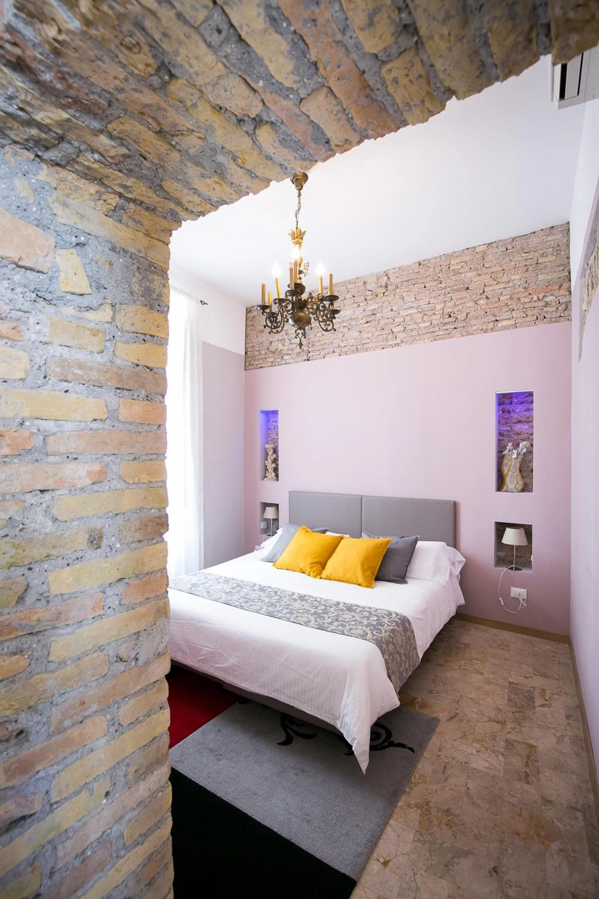 Bed in Nerva Accommodation Cavour