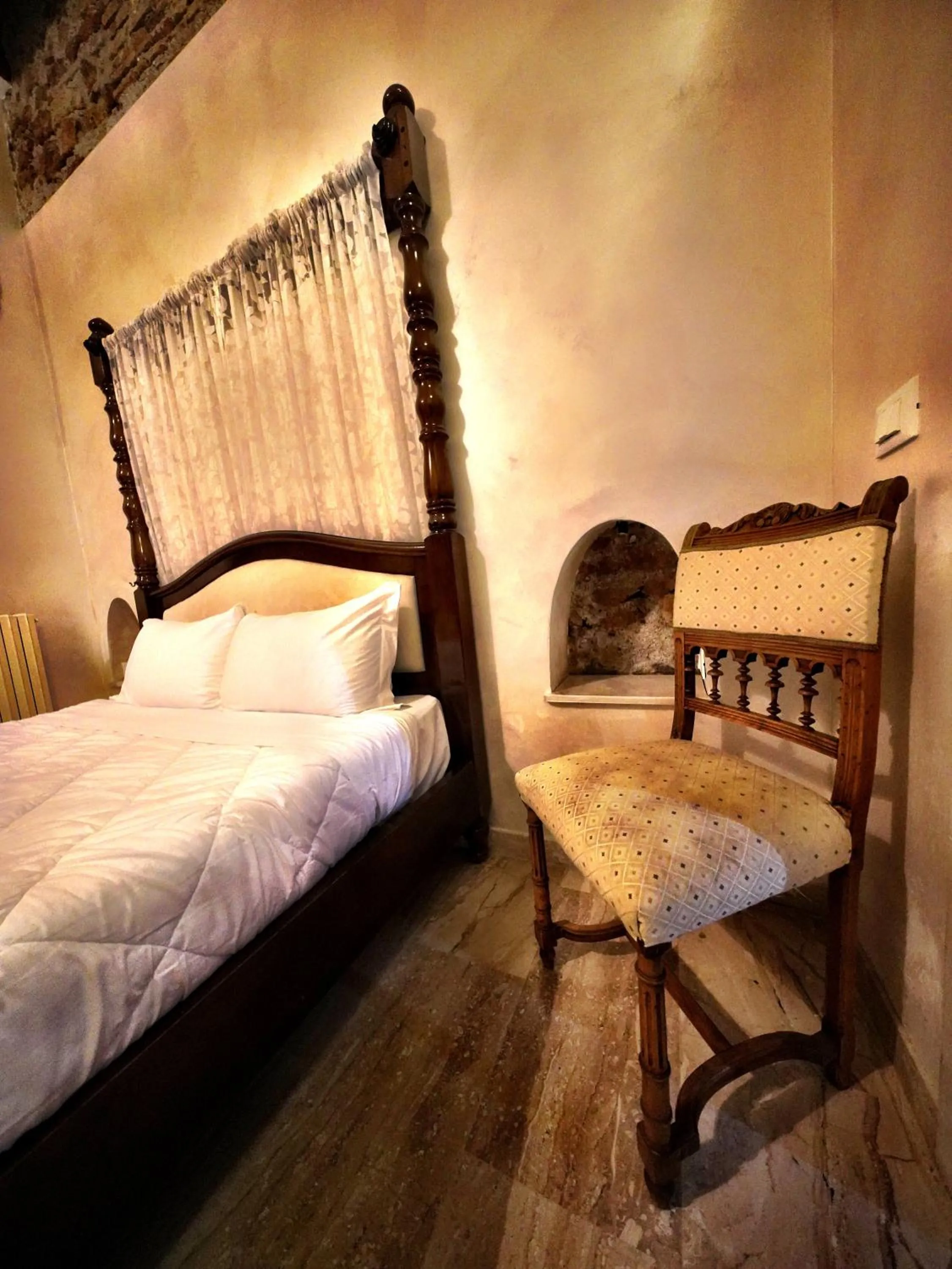 Bed in Nerva Accommodation Cavour