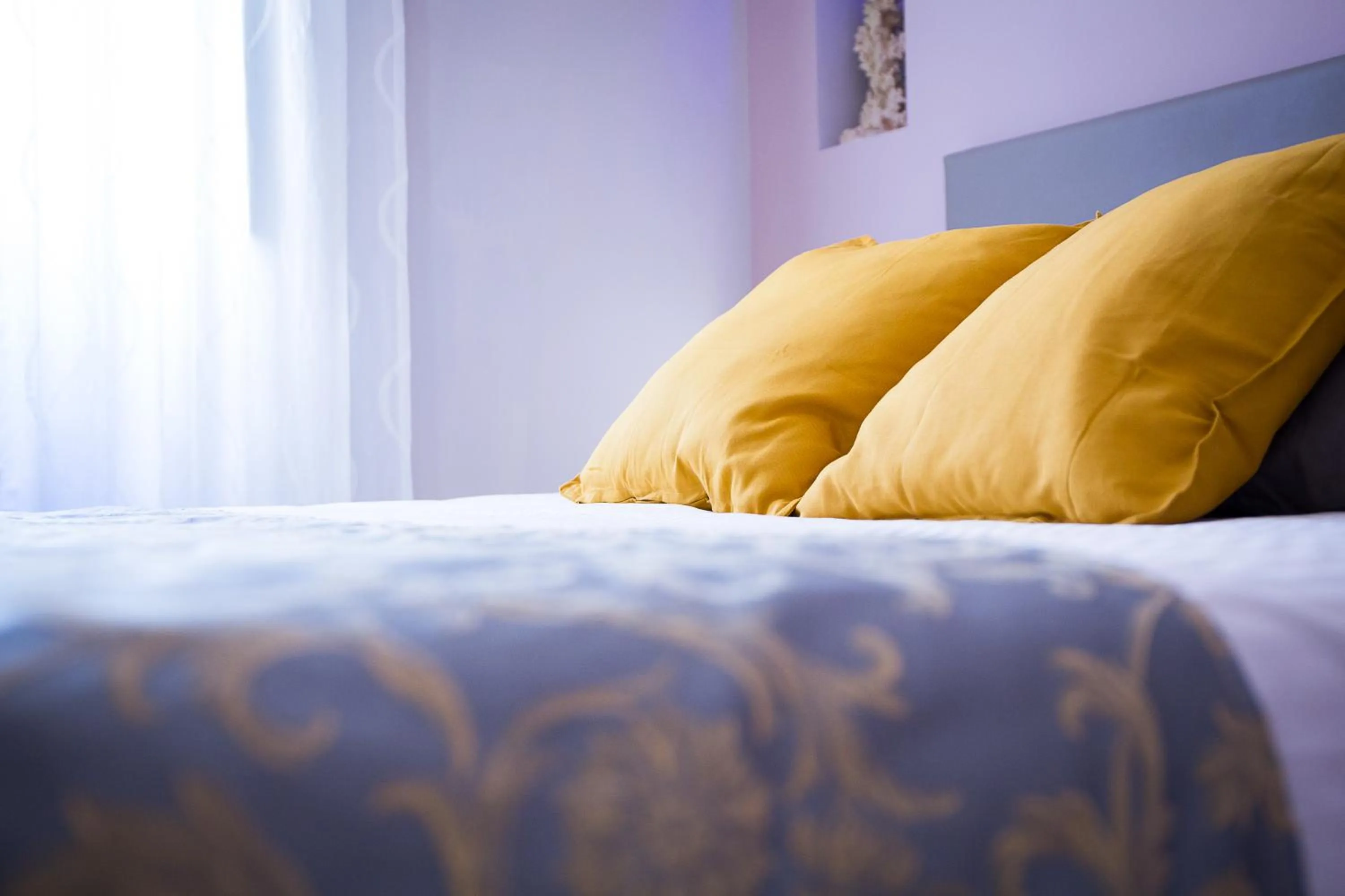 Bed in Nerva Accommodation Cavour