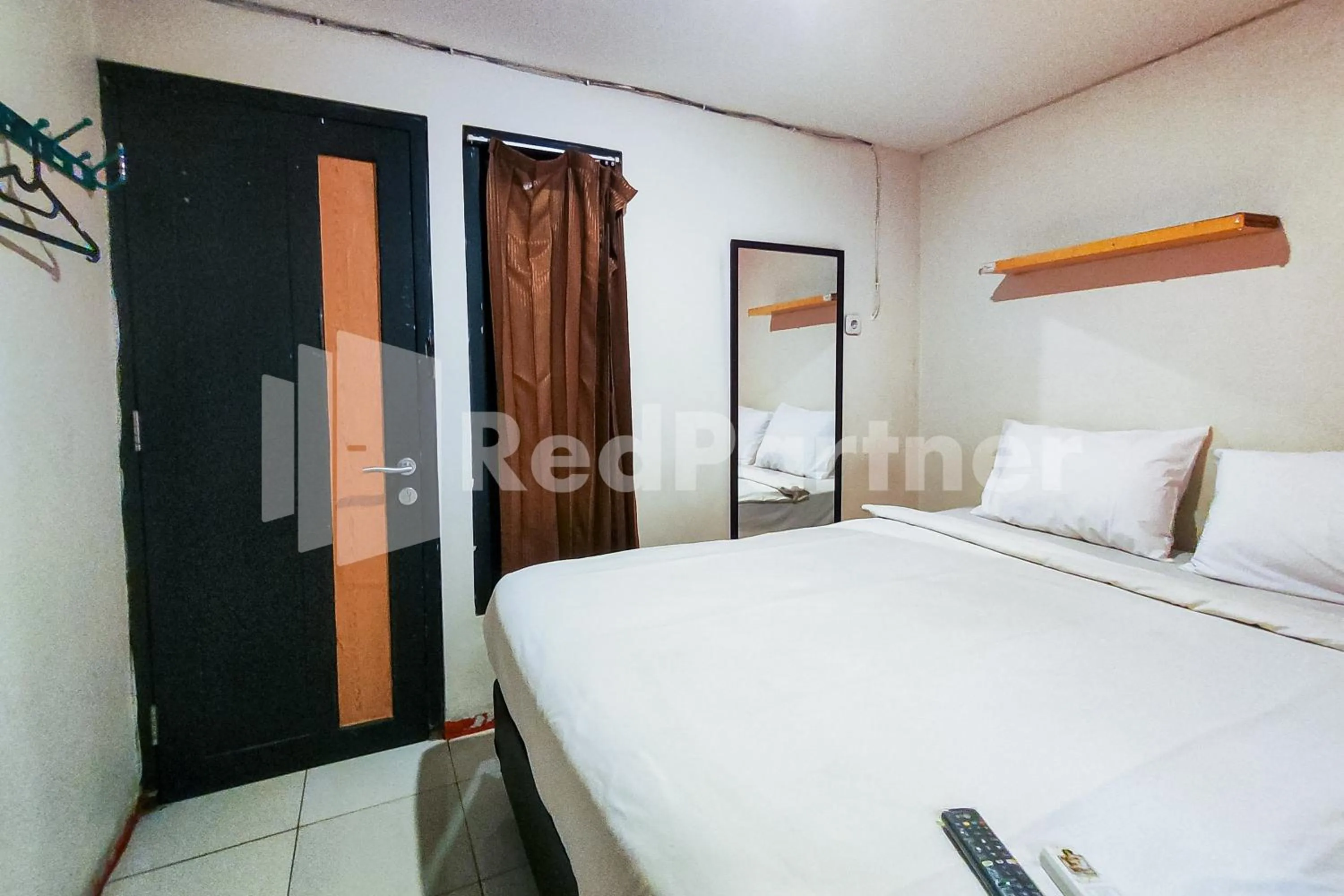 Bedroom, Bed in Audah Guesthouse Syariah RedPartner