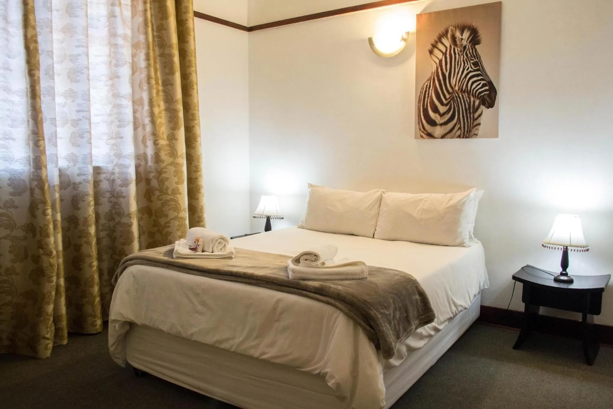 Bed in Premier Hotel and Spa Cullinan