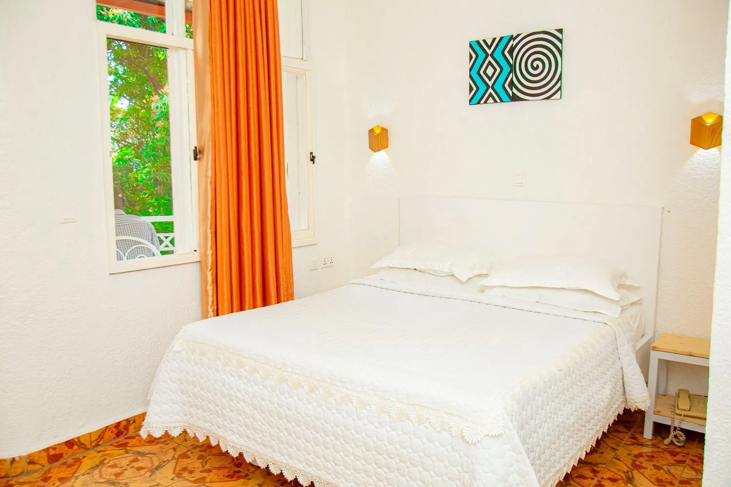 Bed in Musanto Hotel
